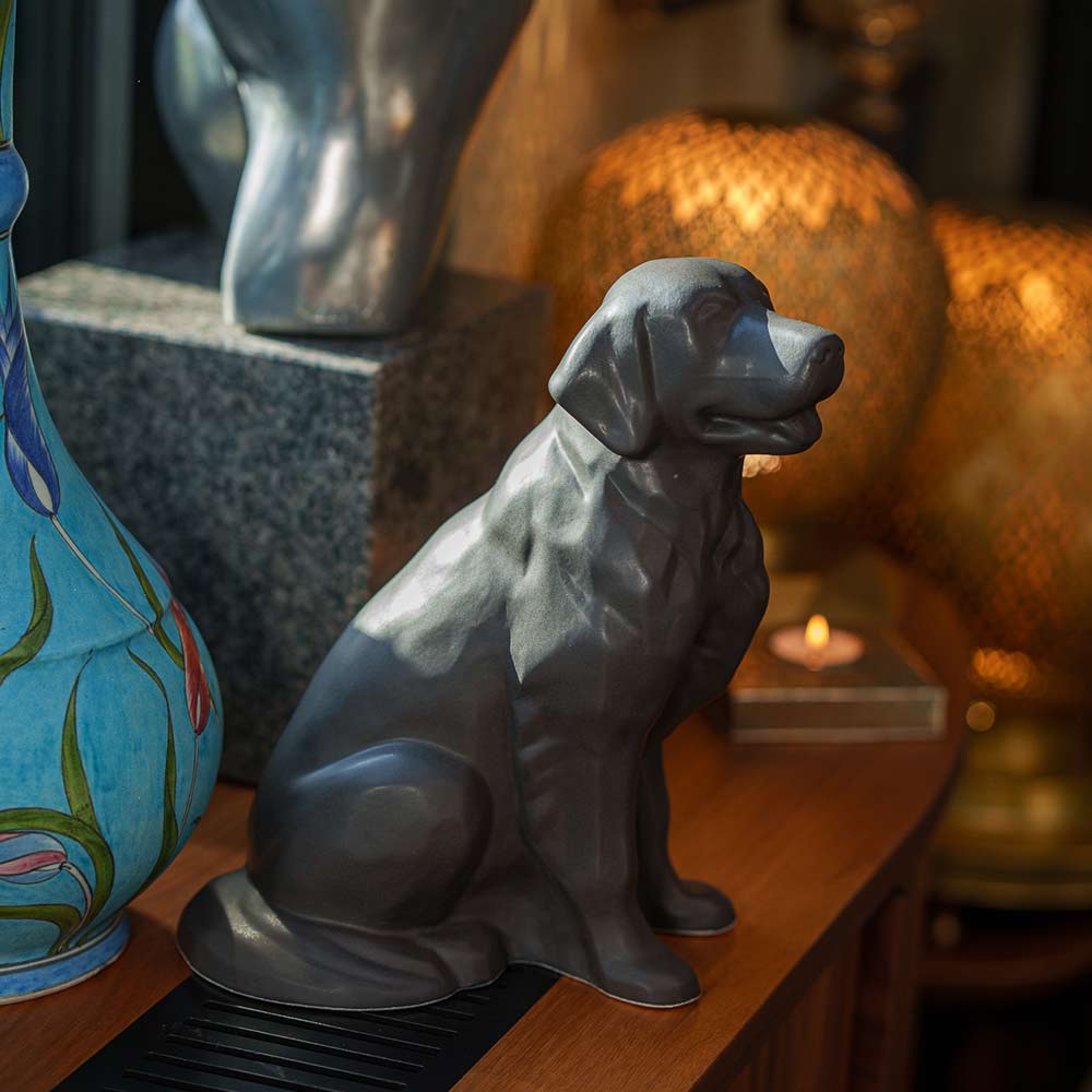 Golden Retriever Pet Urn for Ashes in Matte Grey on Shelf Looking