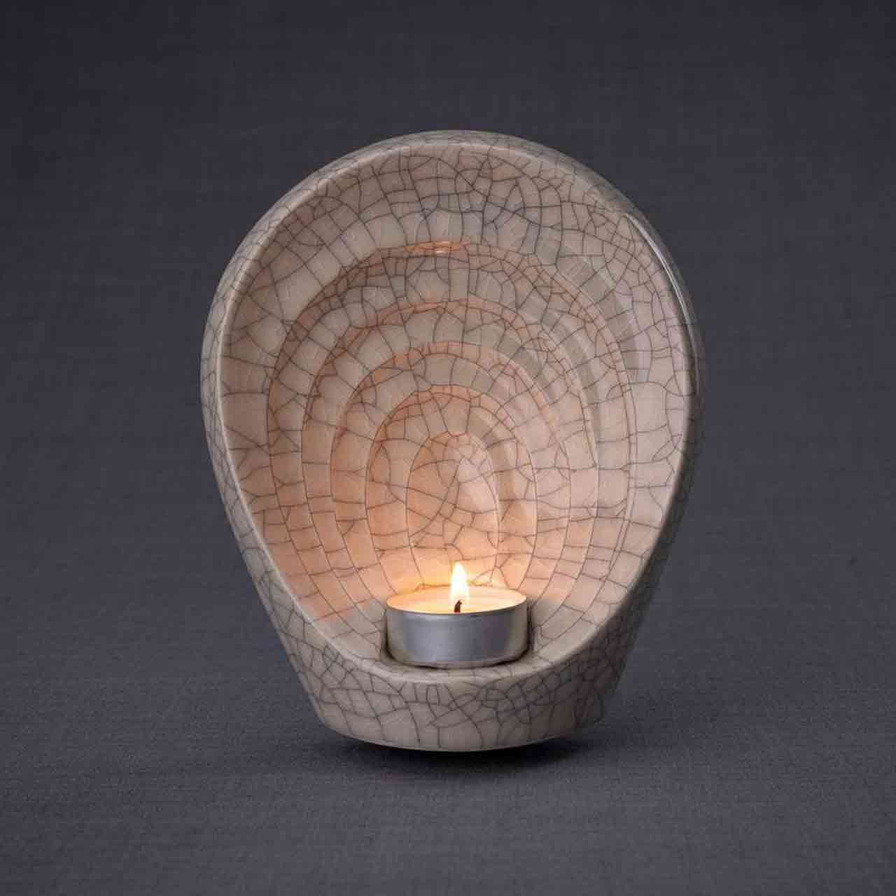 Guardian Angel Ashes Keepsake Urn in Crackle Glaze Dark Background with Flame