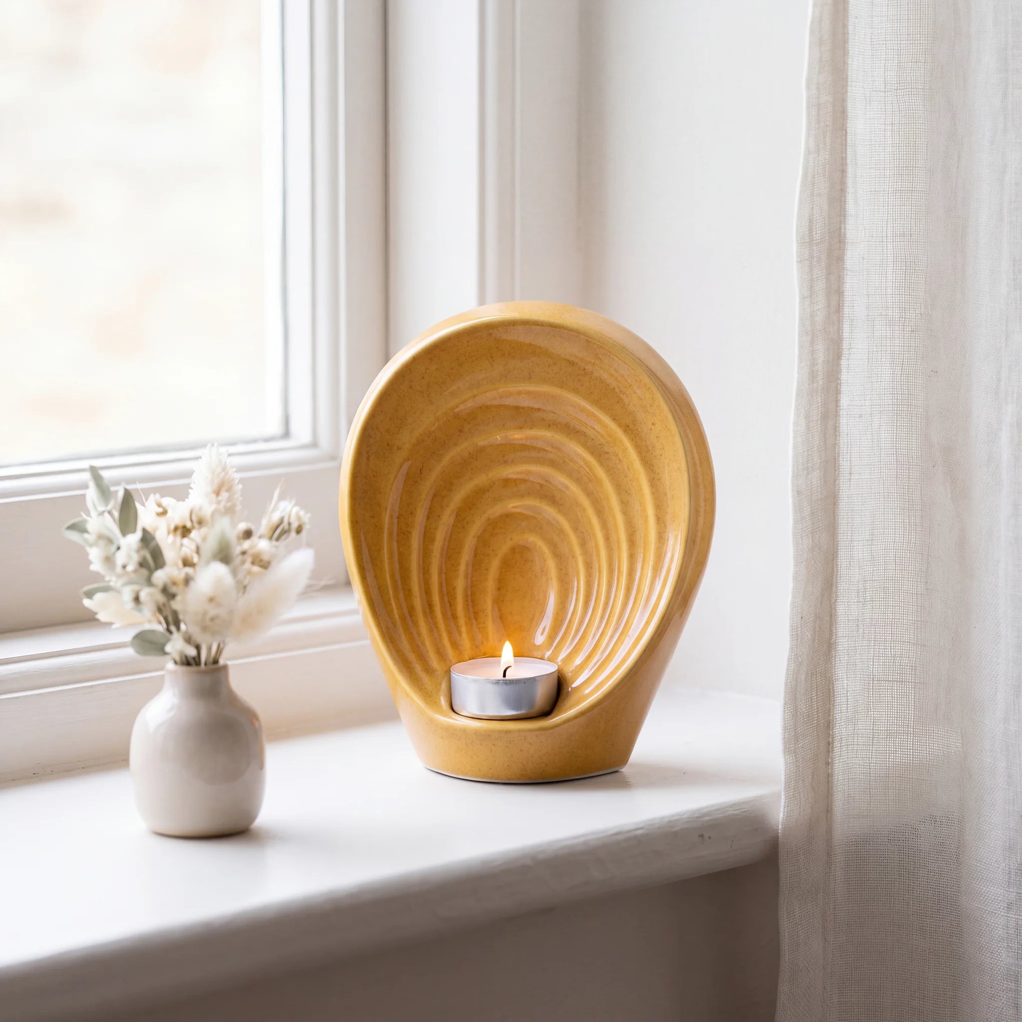 Guardian-Angel-Small-Urn-for-Ashes-in-Amber-keepsake_windowsill_posy-Left-Angle
