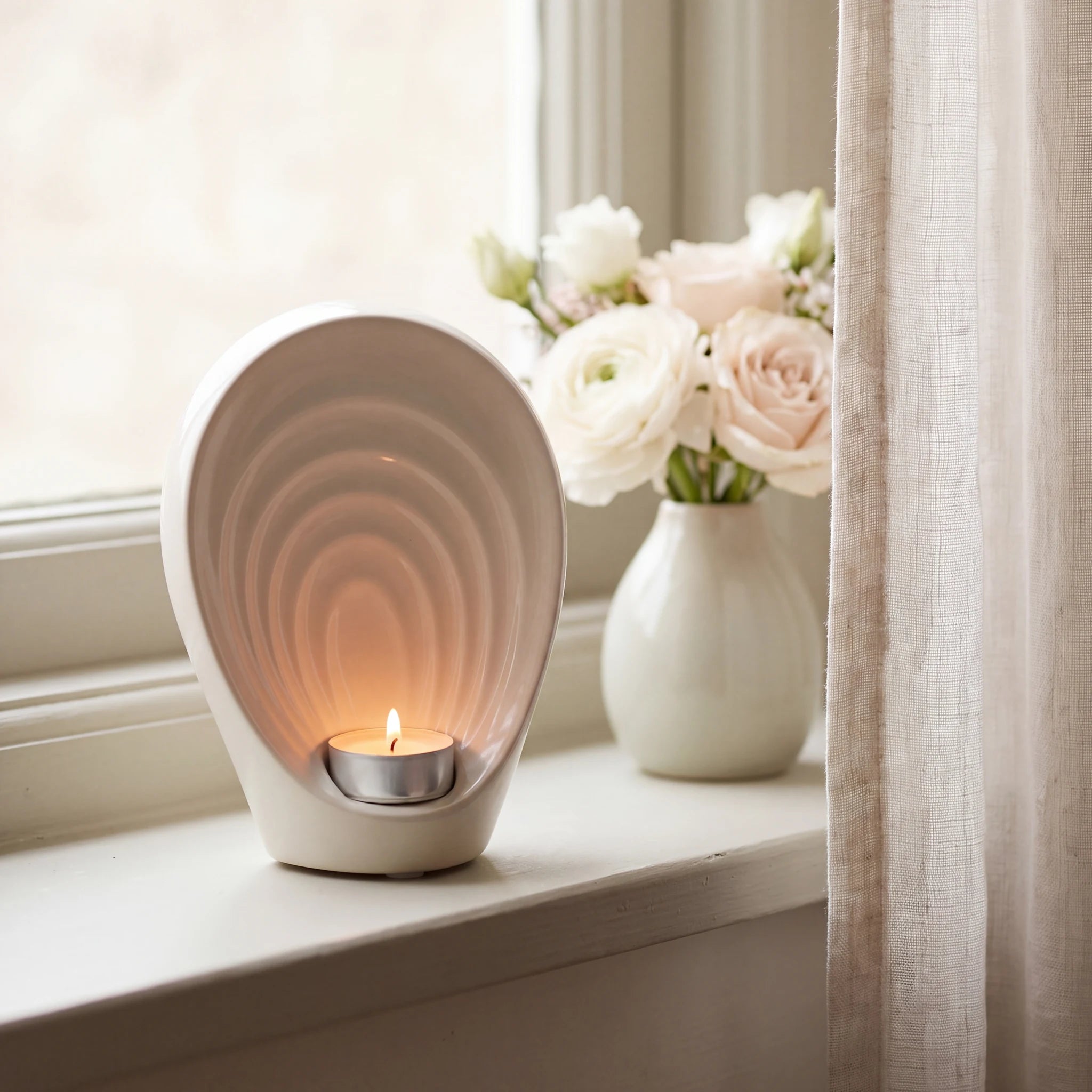 Guardian-Angel-Small-Urn-for-Ashes-in-Cream-keepsake_windowsill_posy-Left-Angle