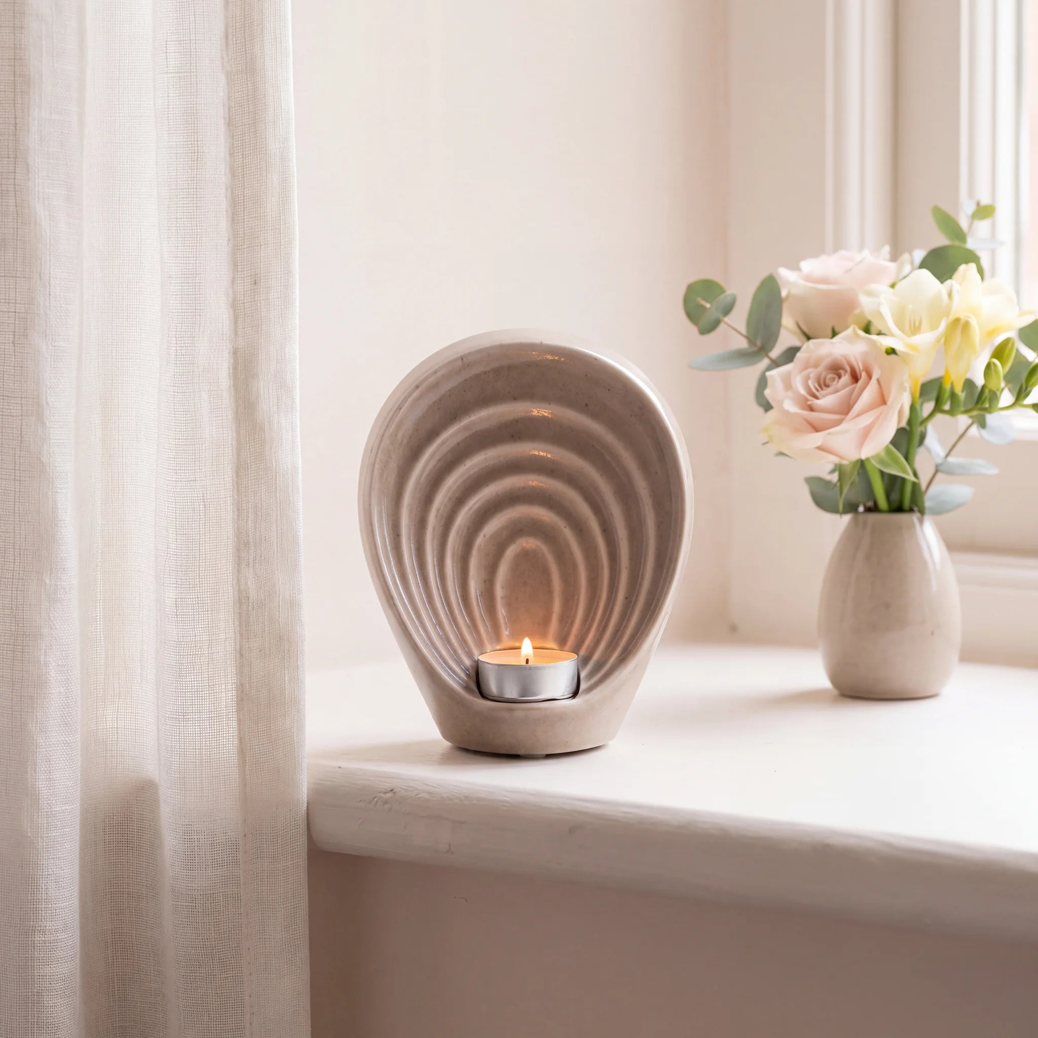 Guardian-Angel-Small-Urn-for-Ashes-in-Dark-Beige-keepsake_windowsill_posy-Left-Angle