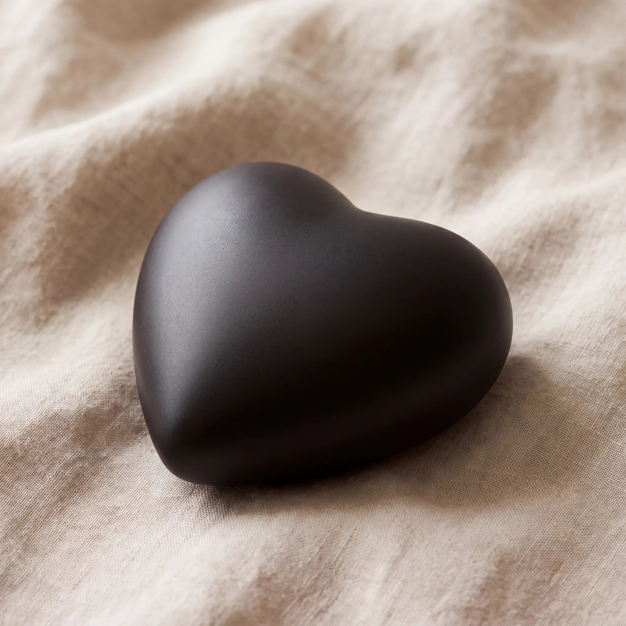 Heart-Keepsake-Urn-for-Ashes-in-Black-On-Linen