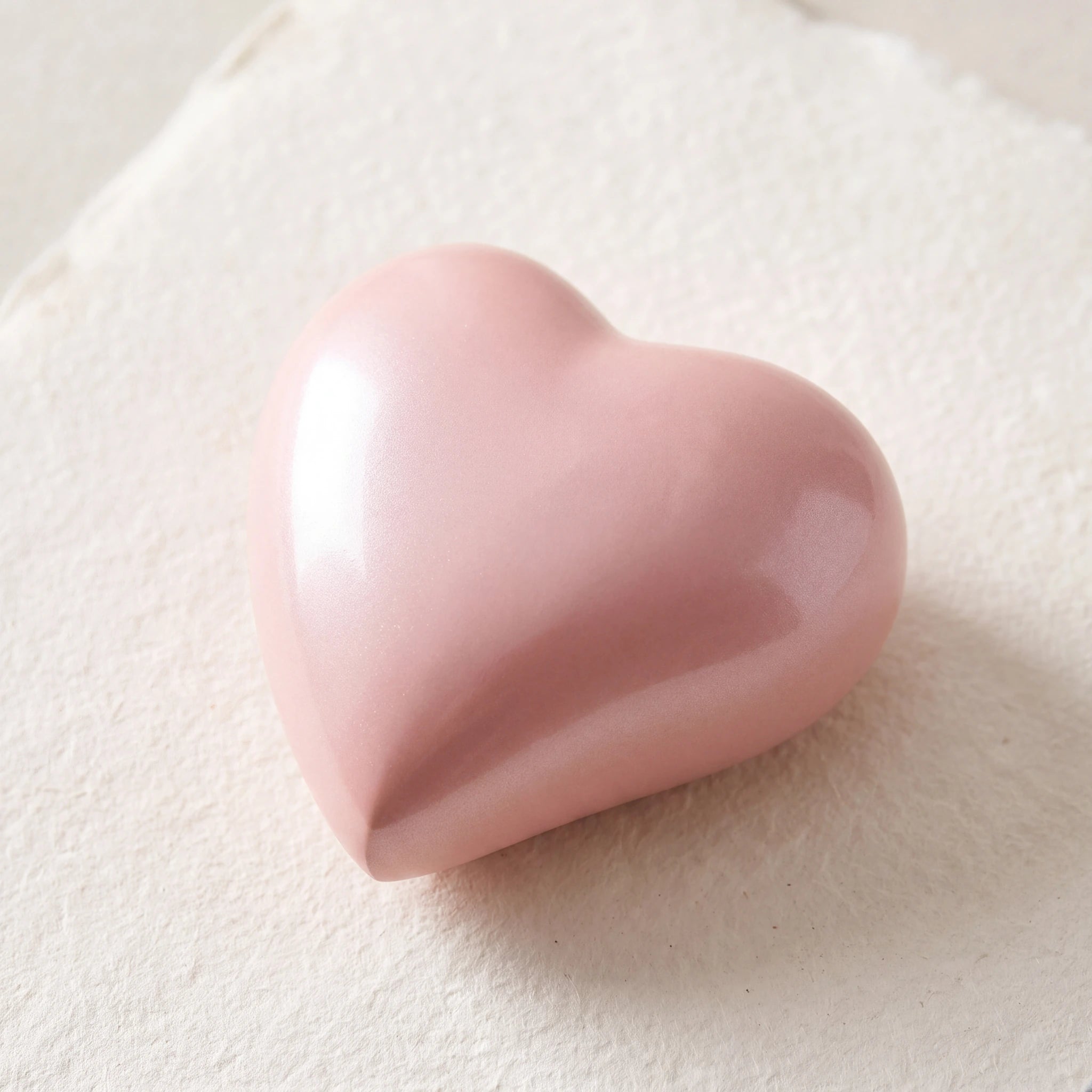 Heart-Keepsake-Urn-for-Ashes-in-Pastel-Pink-Metal-Edition-heart_paper_above