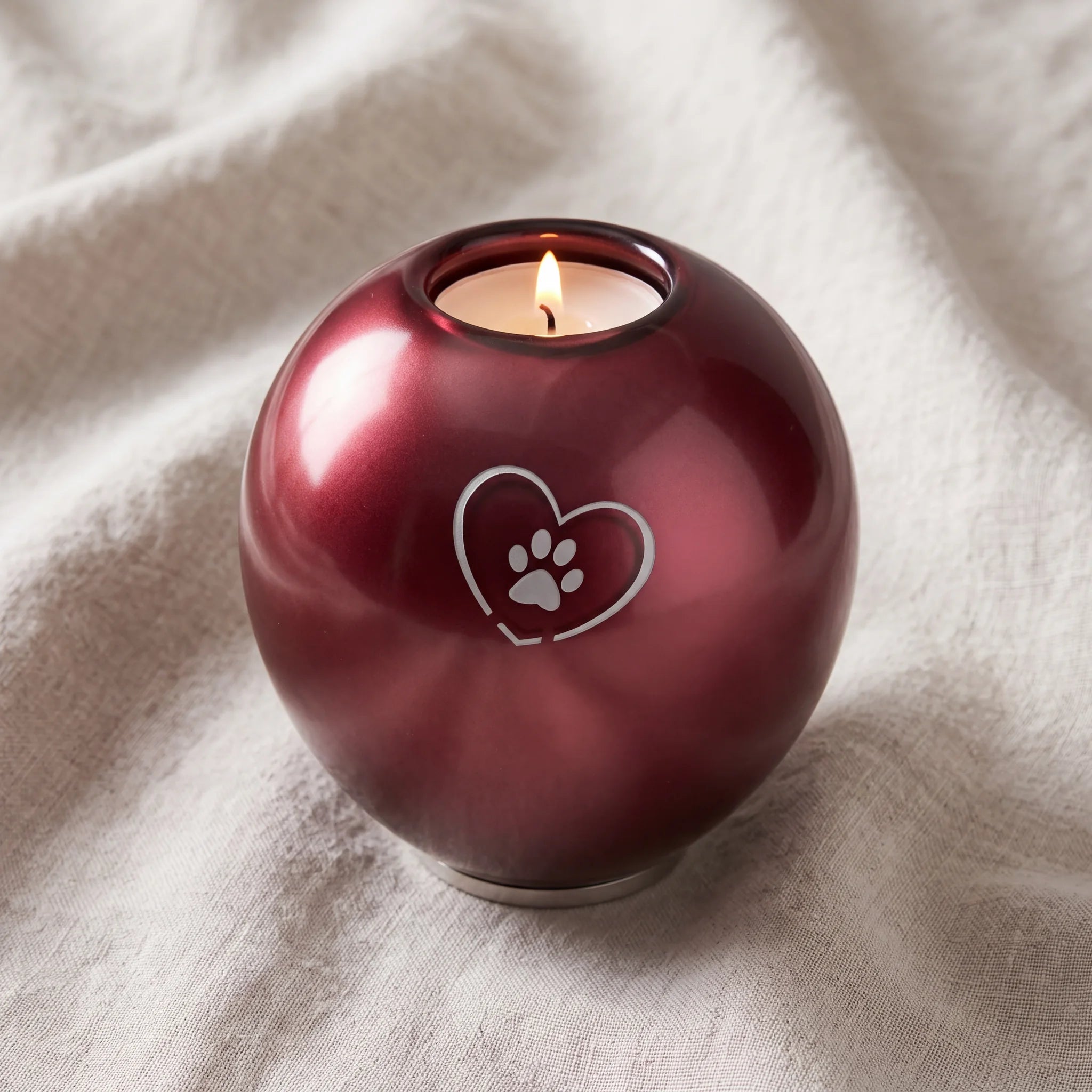 Heart-Pawprint-Crystal-Pet-Candle-Urn-for-Ashes-in-Ruby-Medium-On-Linen