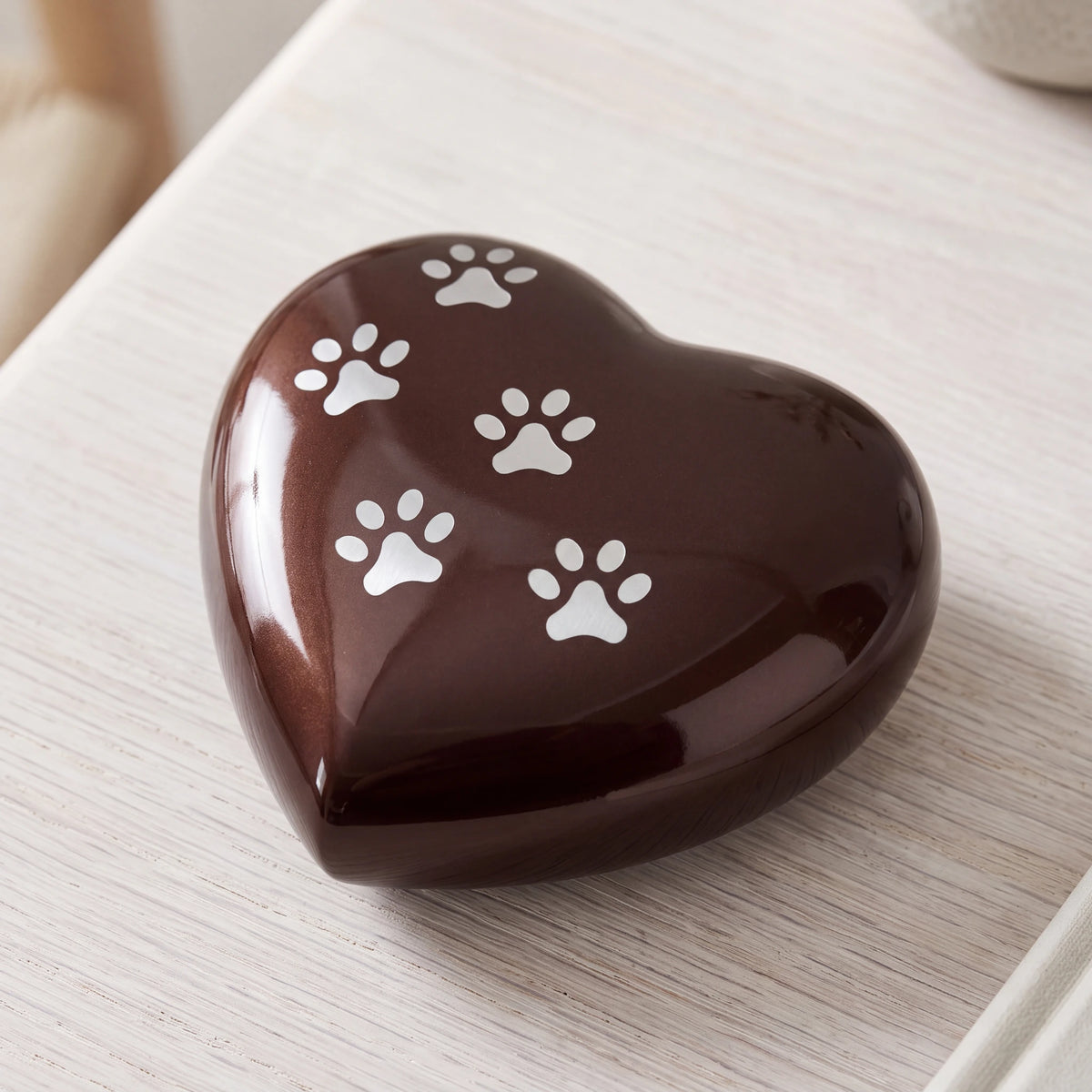 Heart-Pawprints-Pet-Keepsake-Urn-for-Ashes-in-Dark-Brown-Silver-heart_limewash_above
