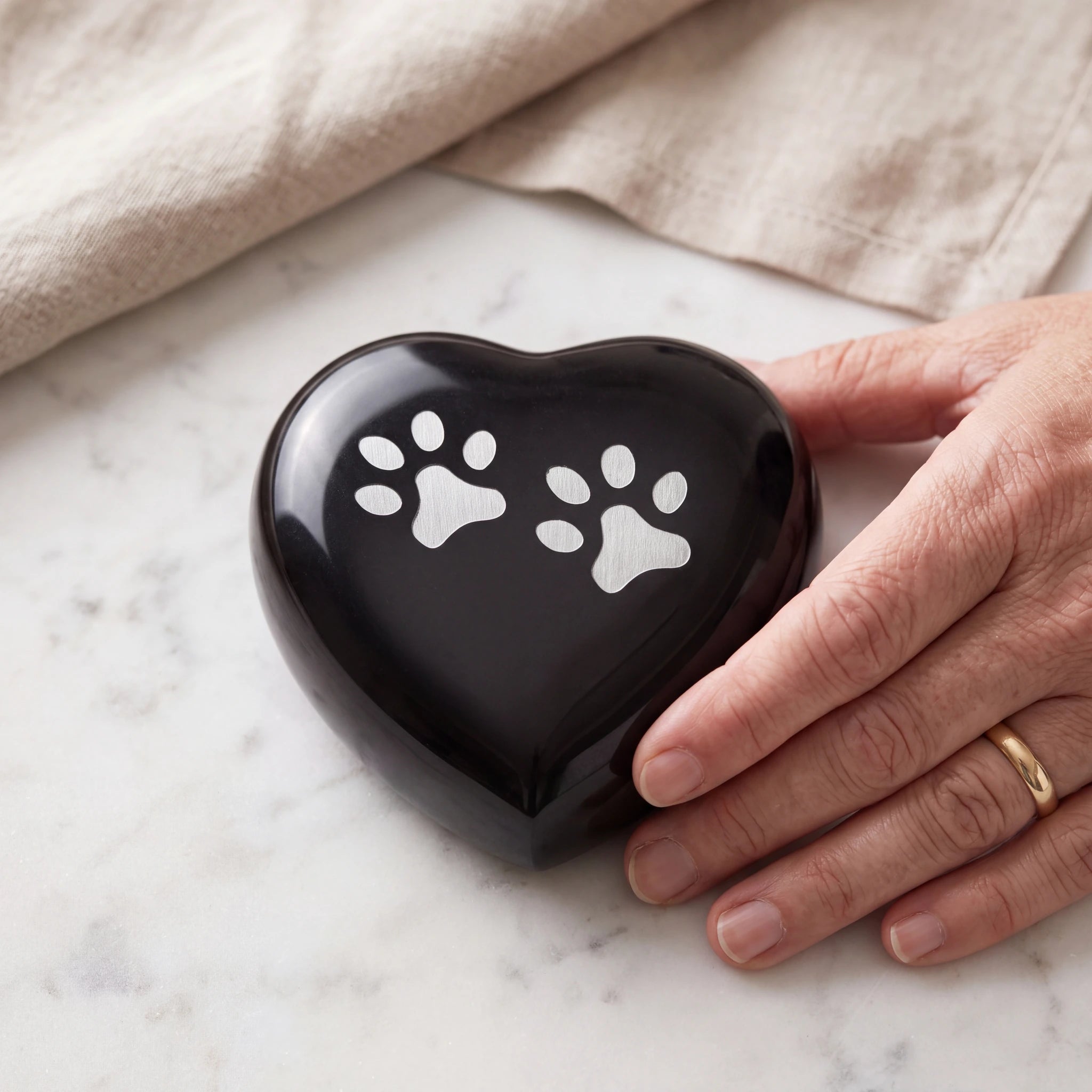 Heart-Pawprints-Pet-Keepsake-Urn-for-Ashes-in-Graphite-Silver-On-Marble