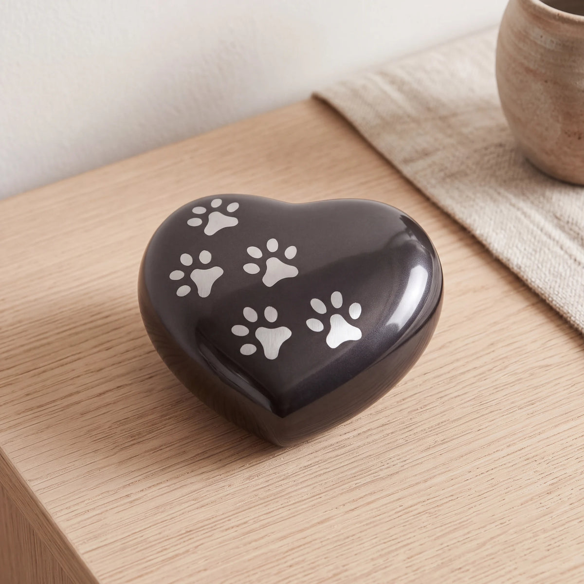 Heart-Pawprints-Pet-Keepsake-Urn-for-Ashes-in-Graphite-Silver-On-Oak