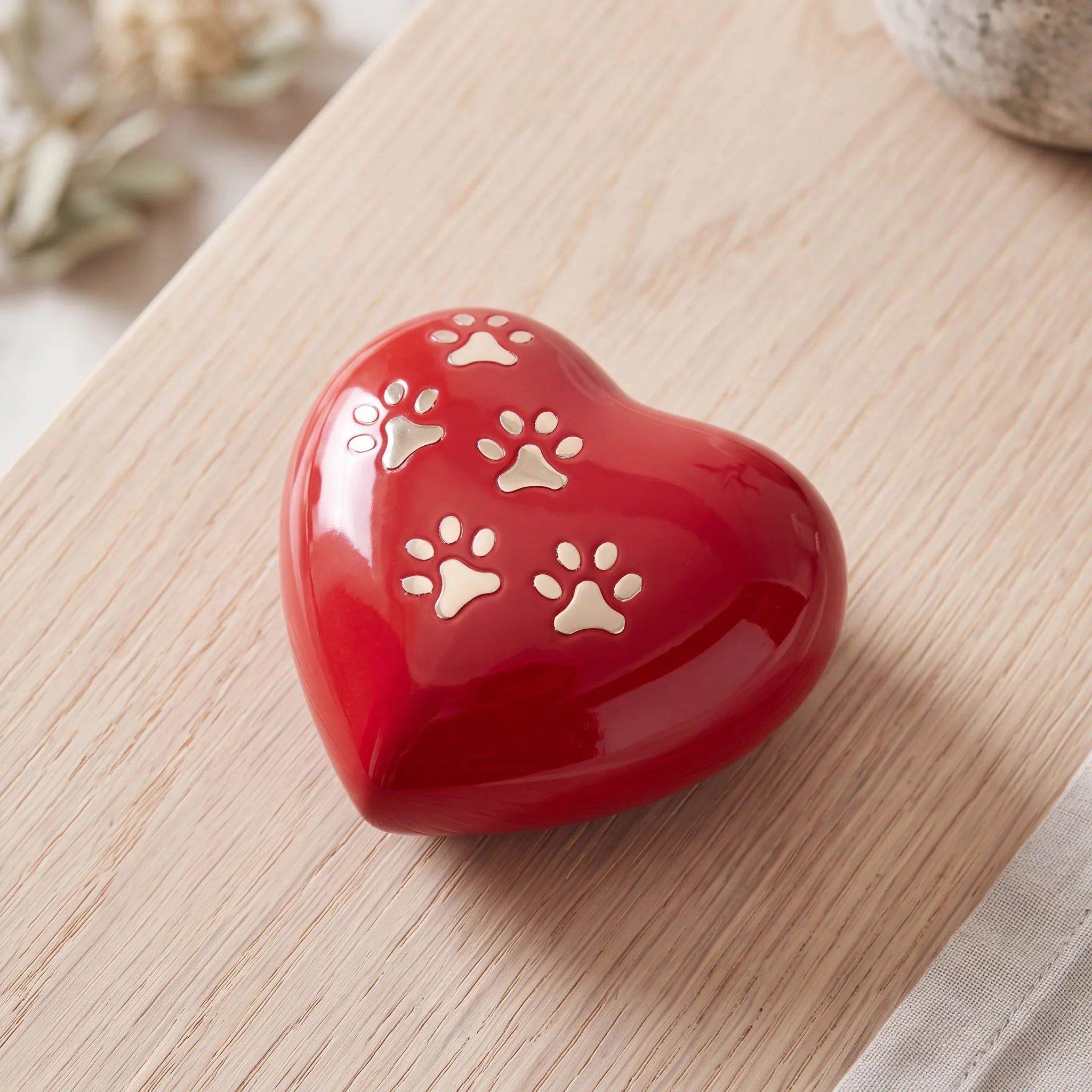 Heart-Pawprints-Pet-Small-Urn-for-Ashes-in-Red-Gold-On-Oak