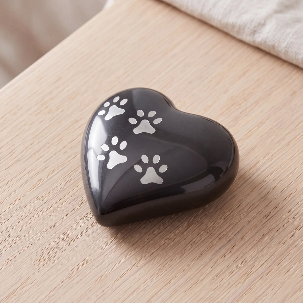 Heart-Pawprints-Pet-Urn-for-Ashes-in-Graphite-Silver-Keepsake-On-Oak