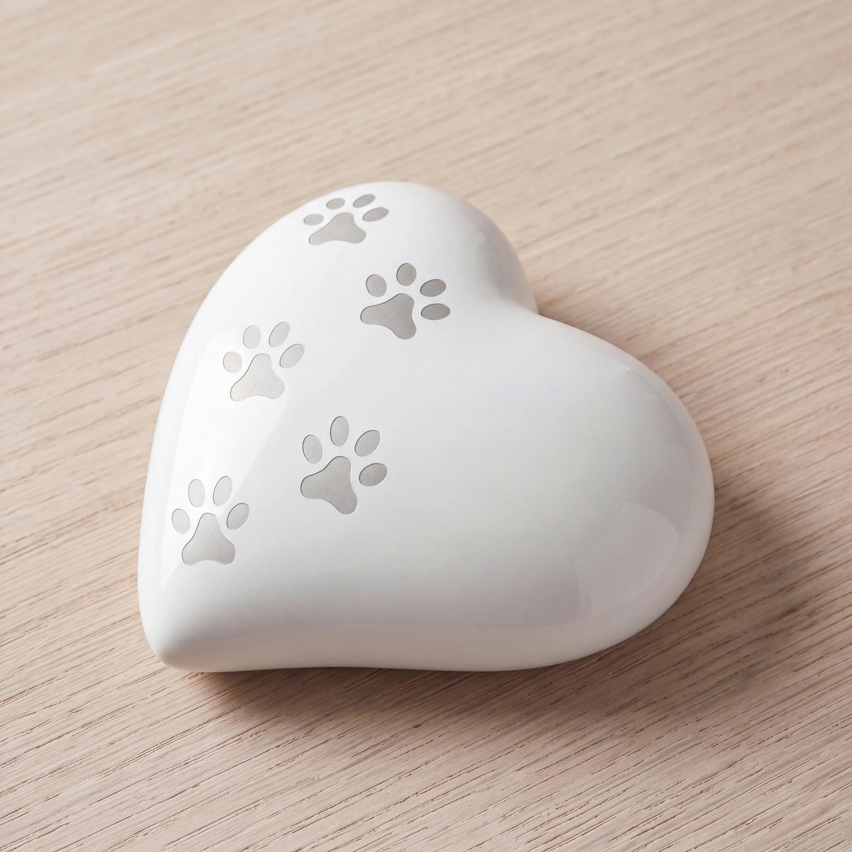 Heart-Pawprints-Pet-Urn-for-Ashes-in-White-Silver-Large-On-Oak