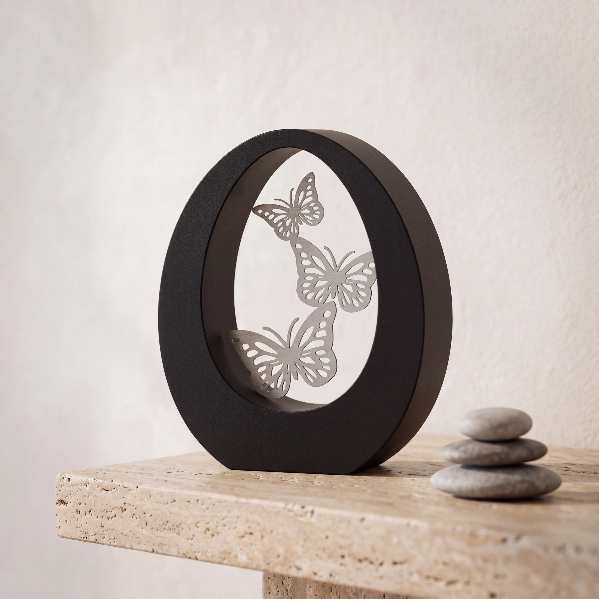 Hearts-Small-Urn-for-Ashes-in-Matte-Black-Stainless-Steel-keepsake_pebbles