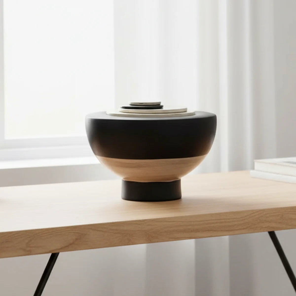 Hemisphere Adult Cremation Urn For Ashes on Desk Near Window