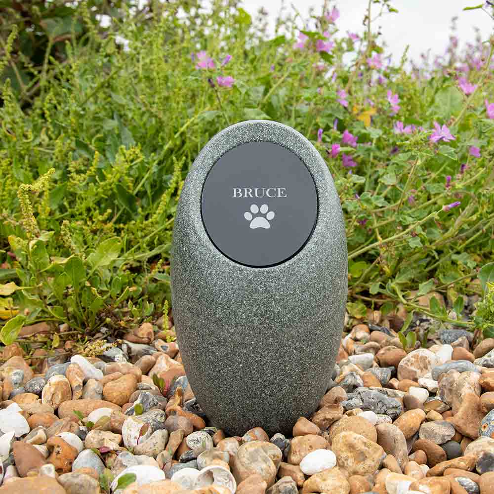 HighDown Outdoor Urn for Ashes with Plaque Black Perspex in on Pebbles