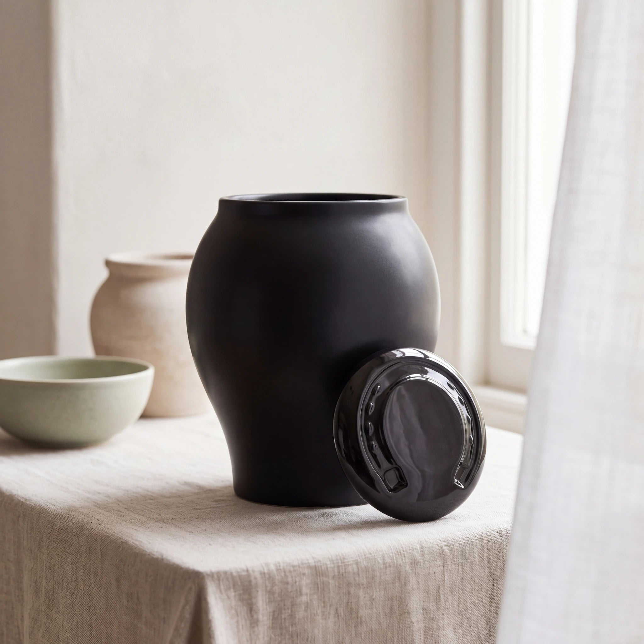 Horse-Cremation-Urn-for-Ashes-in-Pure-Black-Linen-Table