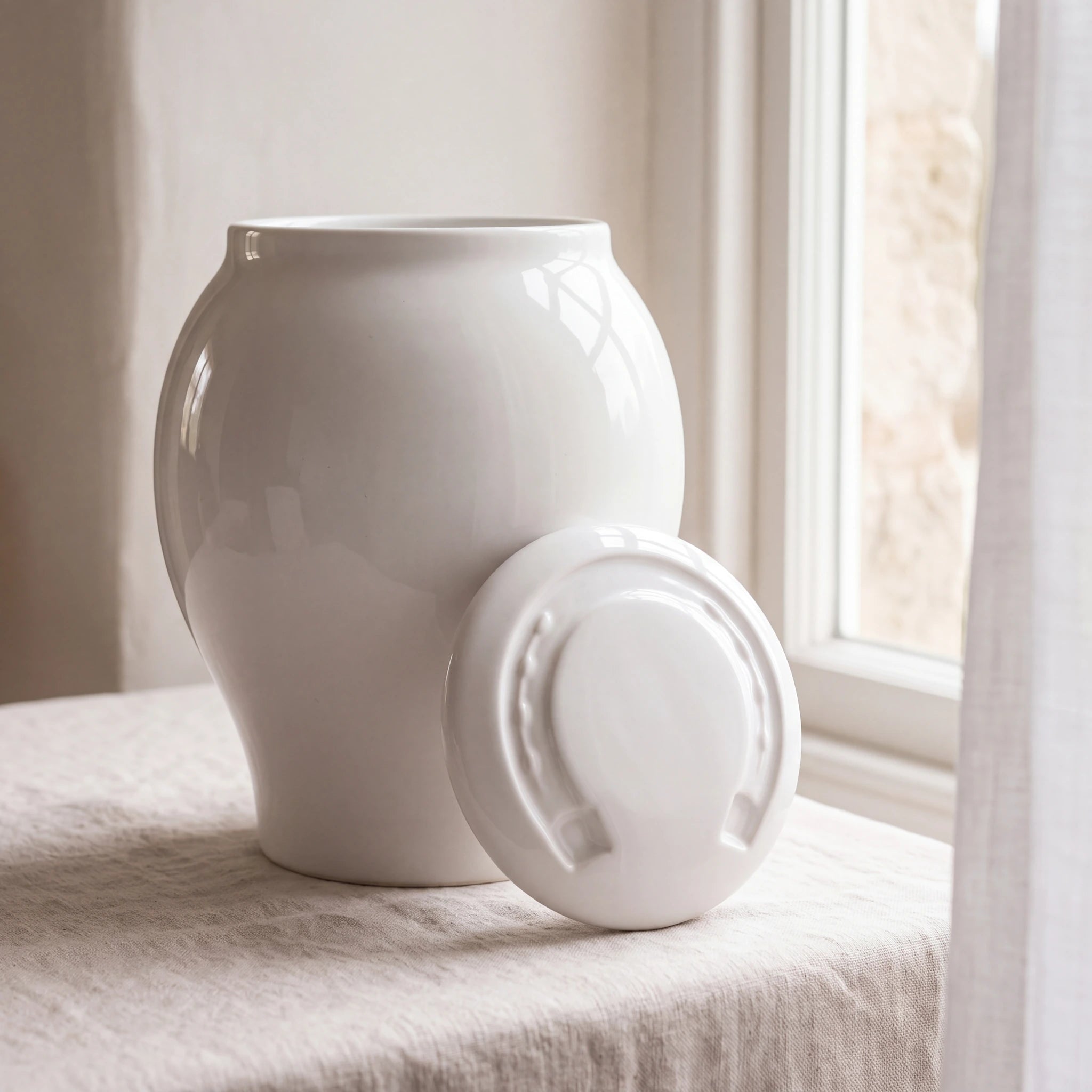 Horse-Cremation-Urn-for-Ashes-in-Pure-White-Linen-Table