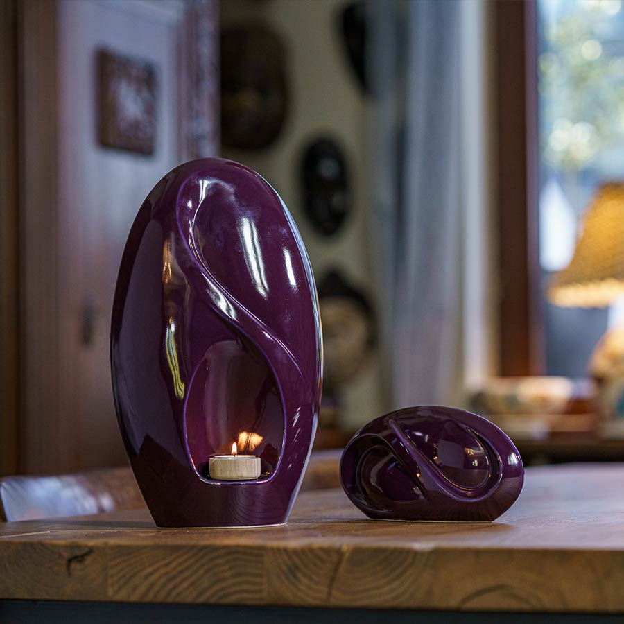 Infinity Small Urn for Ashes Violet with Adult Urn on Table