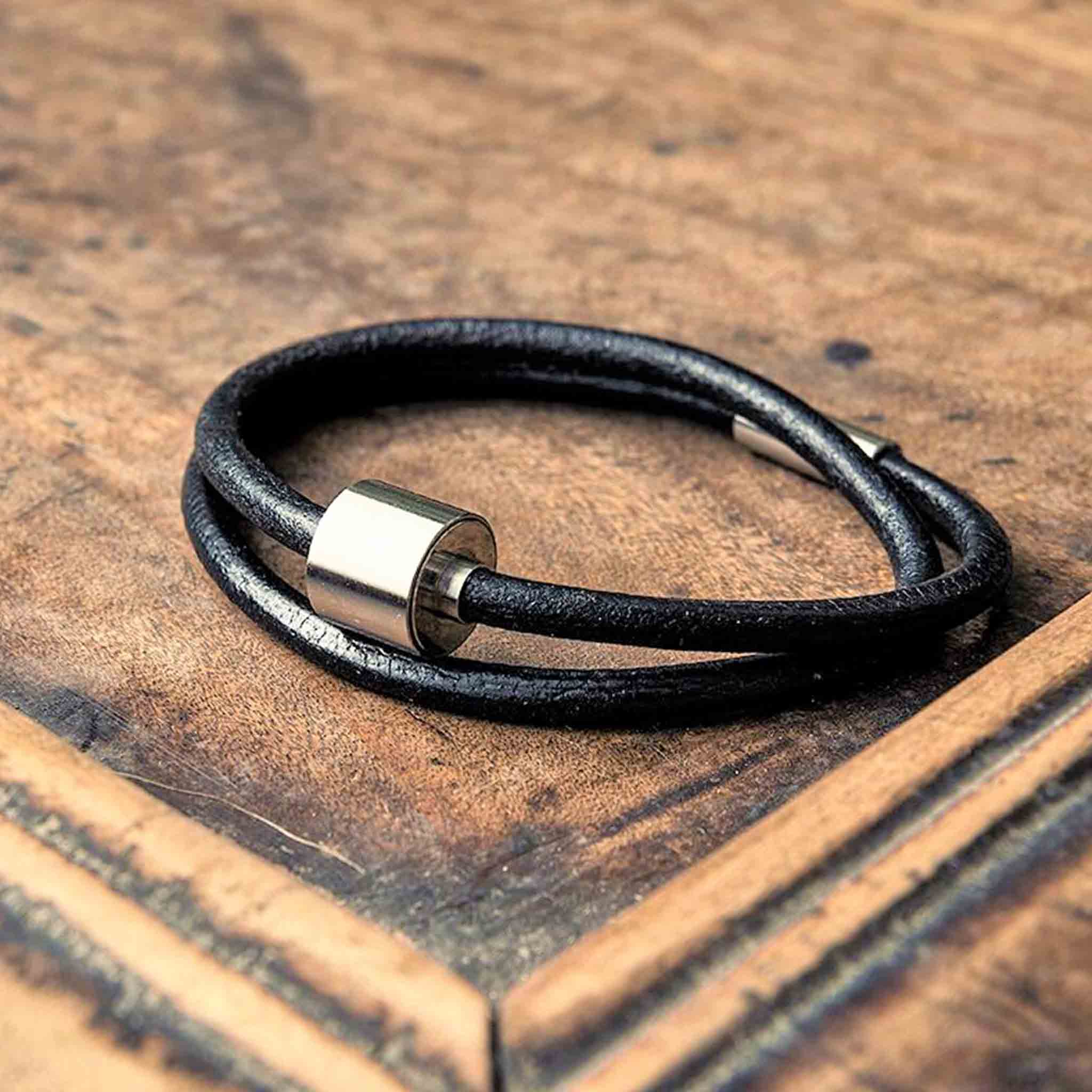 Leather Ashes Bracelet for Men in Black on Desk