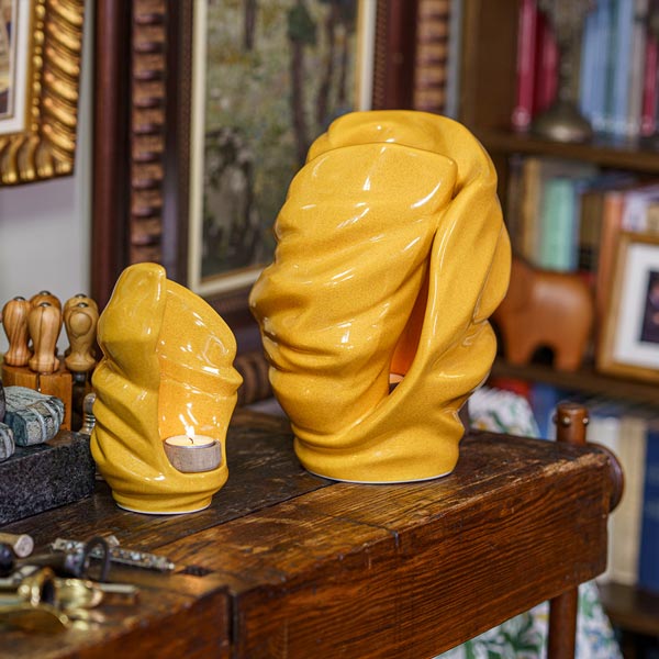 Light Cremation Urn for Ashes Amber with Keepsake on Shelf