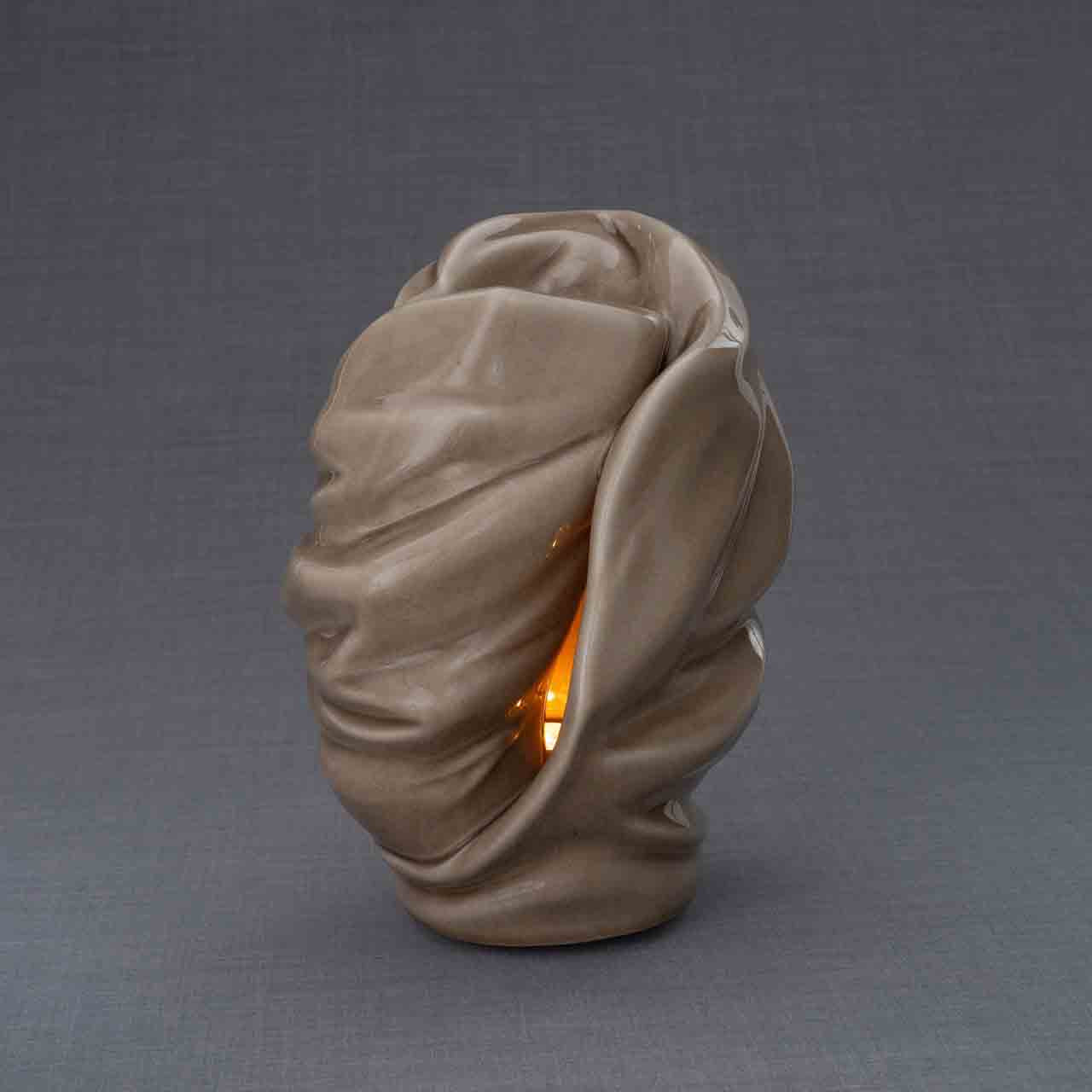 Light Cremation Urn for Ashes in Dark Beige Turned Right Dark Background