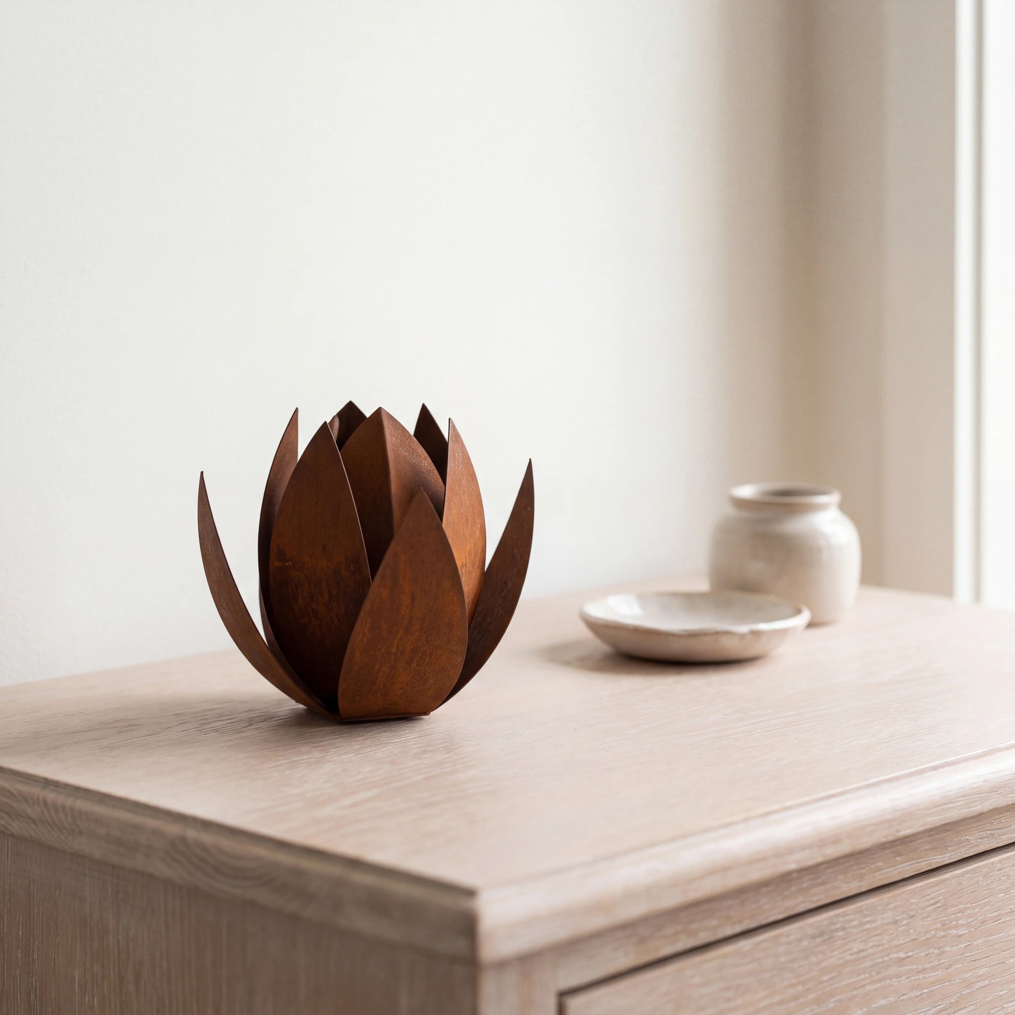 Lotus-Extra-Small-Urn-for-Ashes-in-Corten-Steel-keepsake_dresser_beads