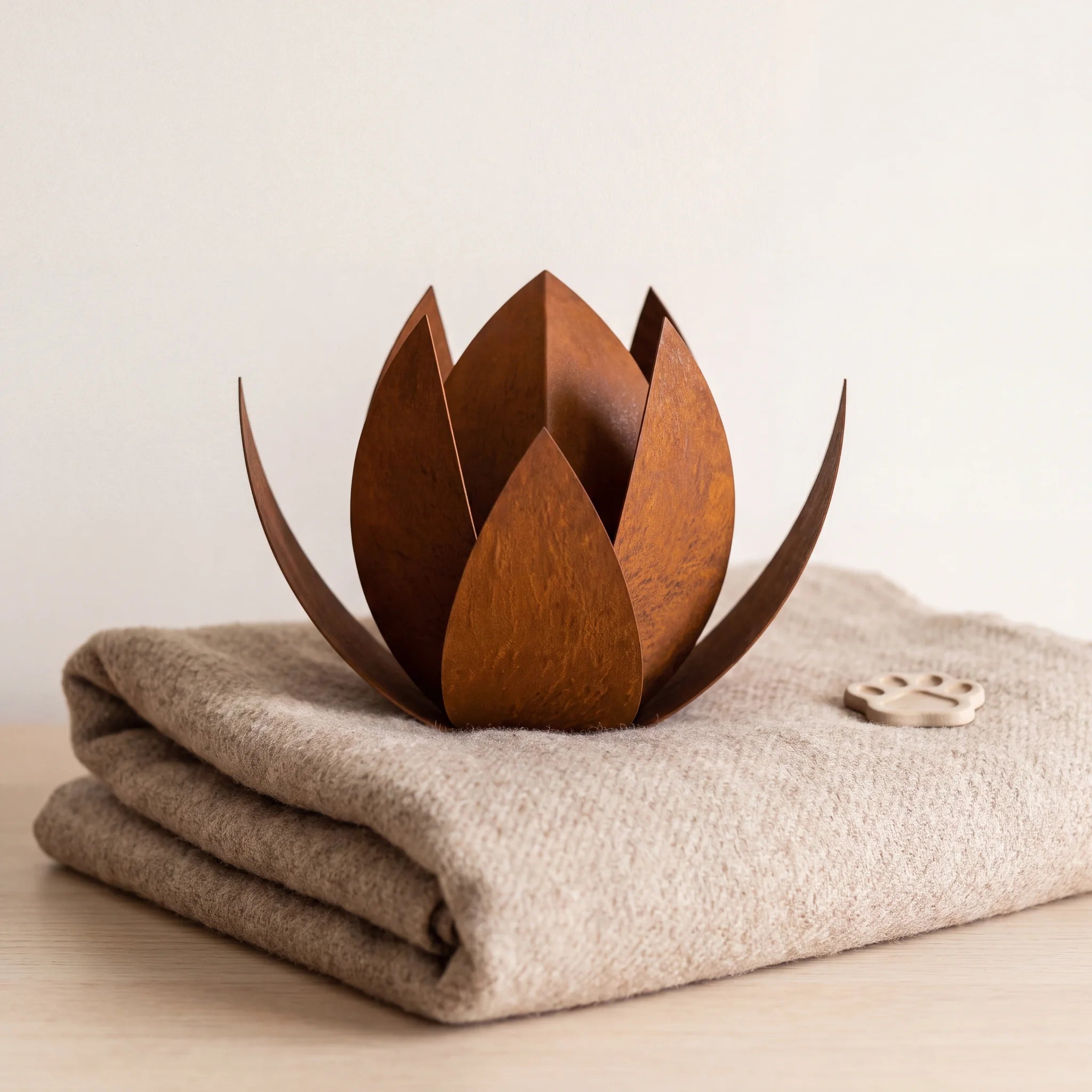 Lotus-Pet-Urn-for-Ashes-in-Corten-Steel-pet_blanket_fold