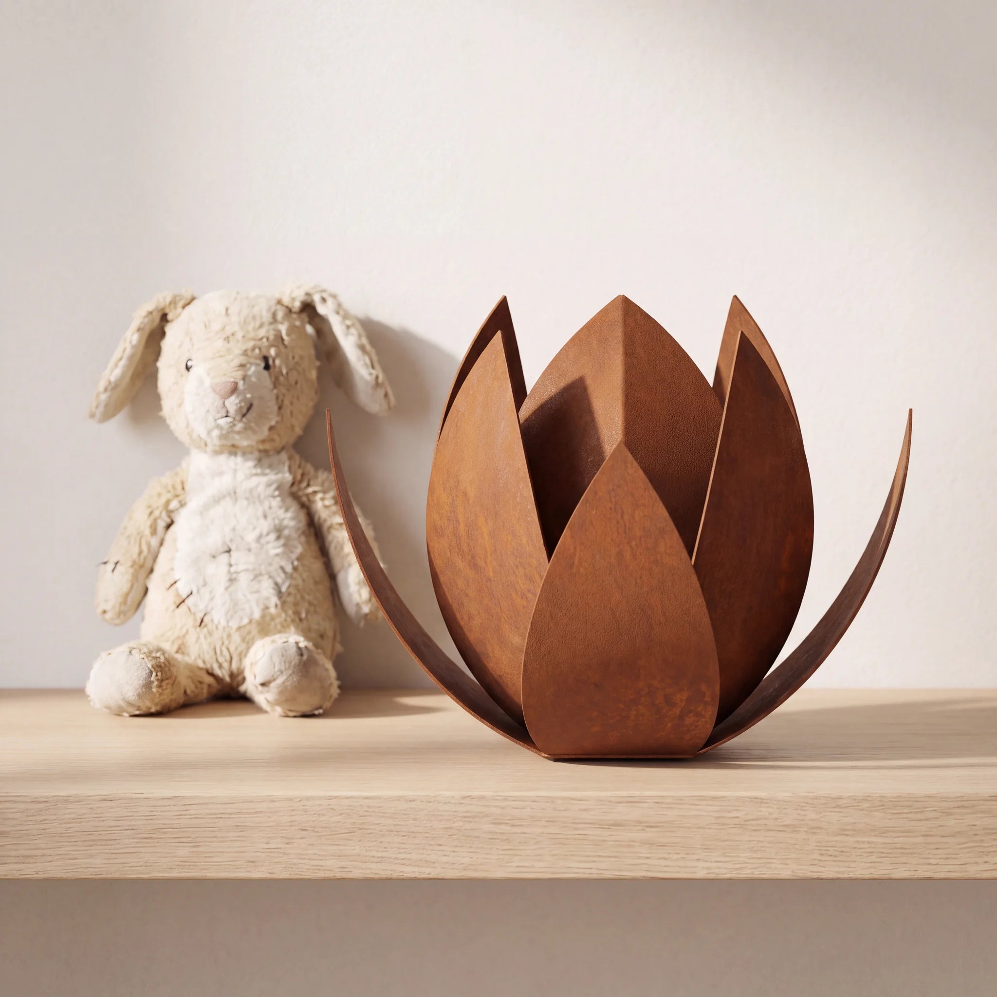 Lotus-Pet-Urn-for-Ashes-in-Corten-Steel-pet_soft_toy_shelf