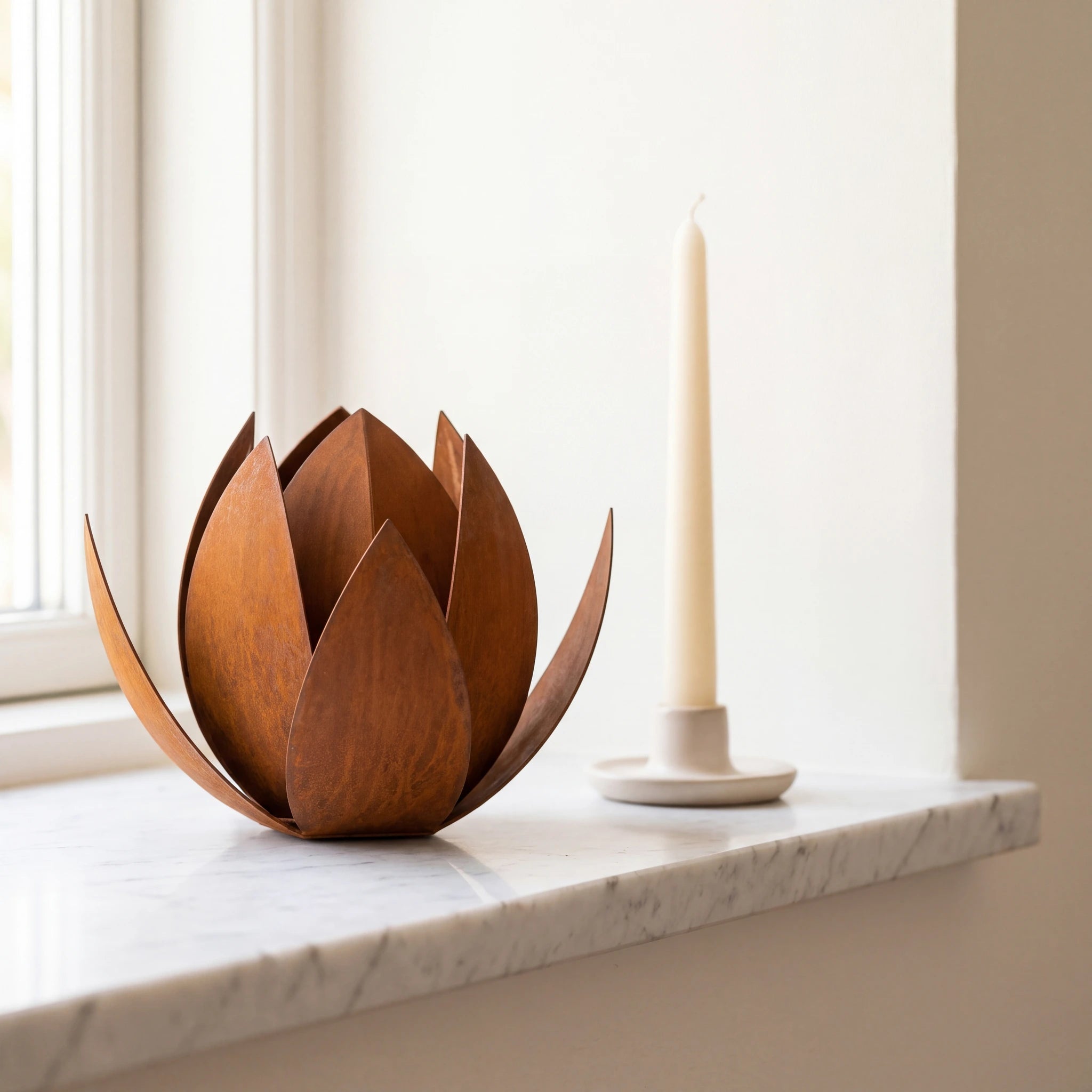 Lotus-Small-Urn-for-Ashes-in-Corten-Steel-Marble-Ledge