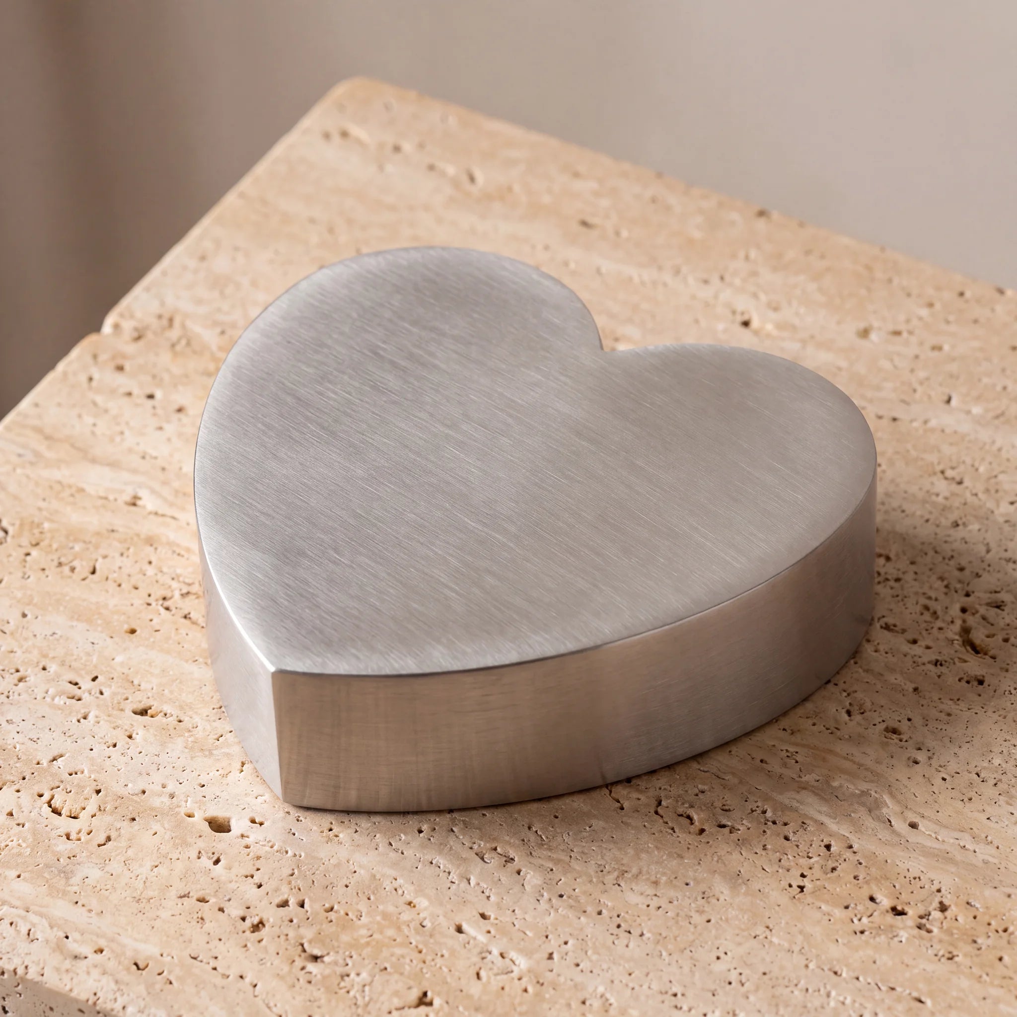 Love-Heart-Companion-Urns-for-Two-Adults-in-Stainless-Steel-On-Travertine