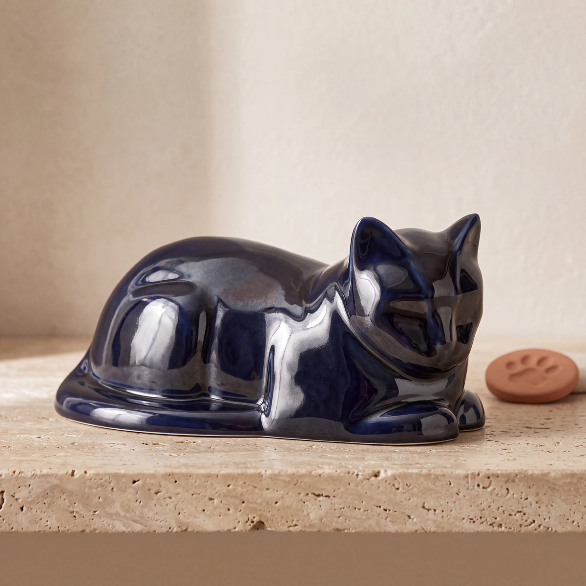 Lying-Cat-Urn-for-Ashes-in-Metallic-Blue-pet_paw_token