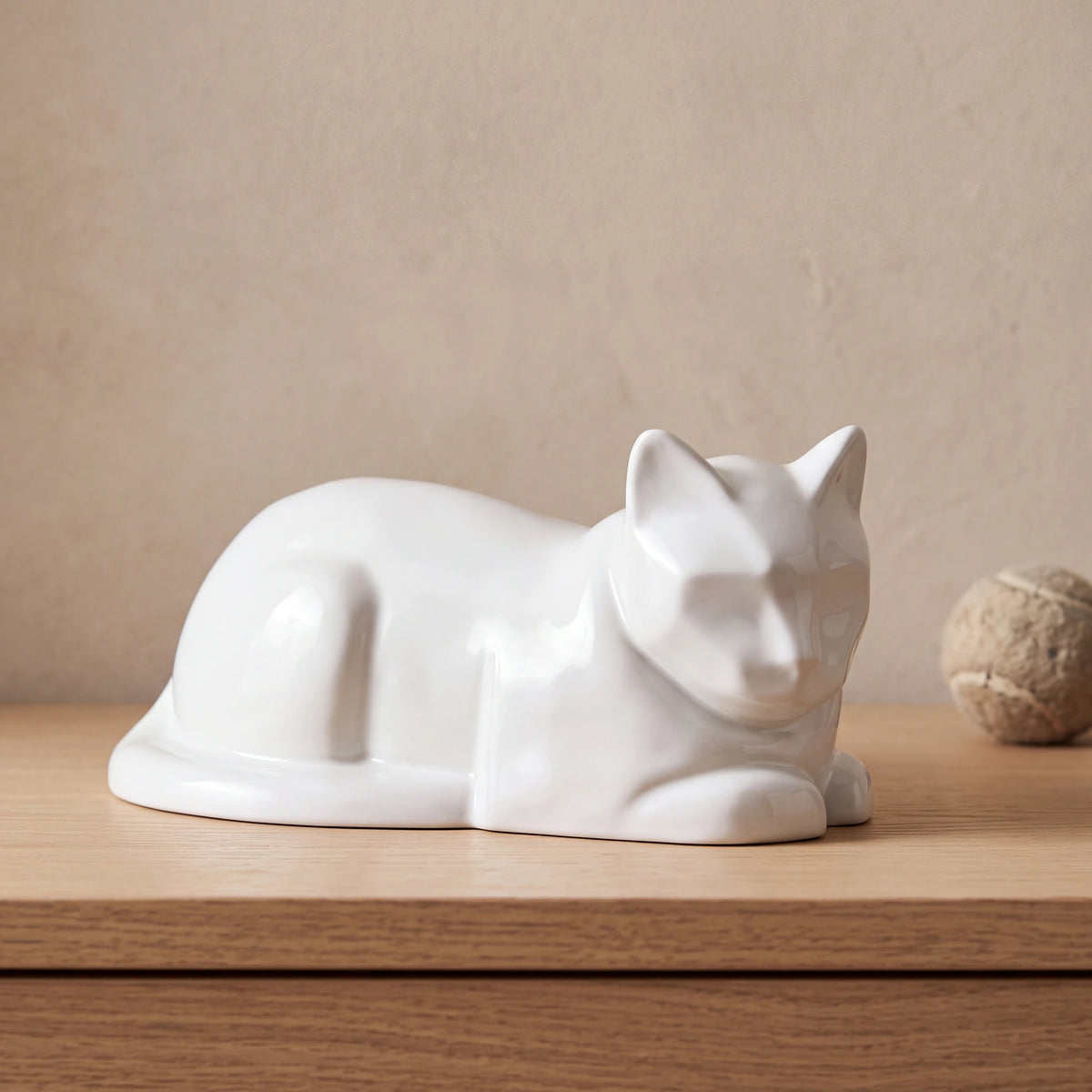 Lying-Cat-Urn-for-Ashes-in-White-pet_console_ball
