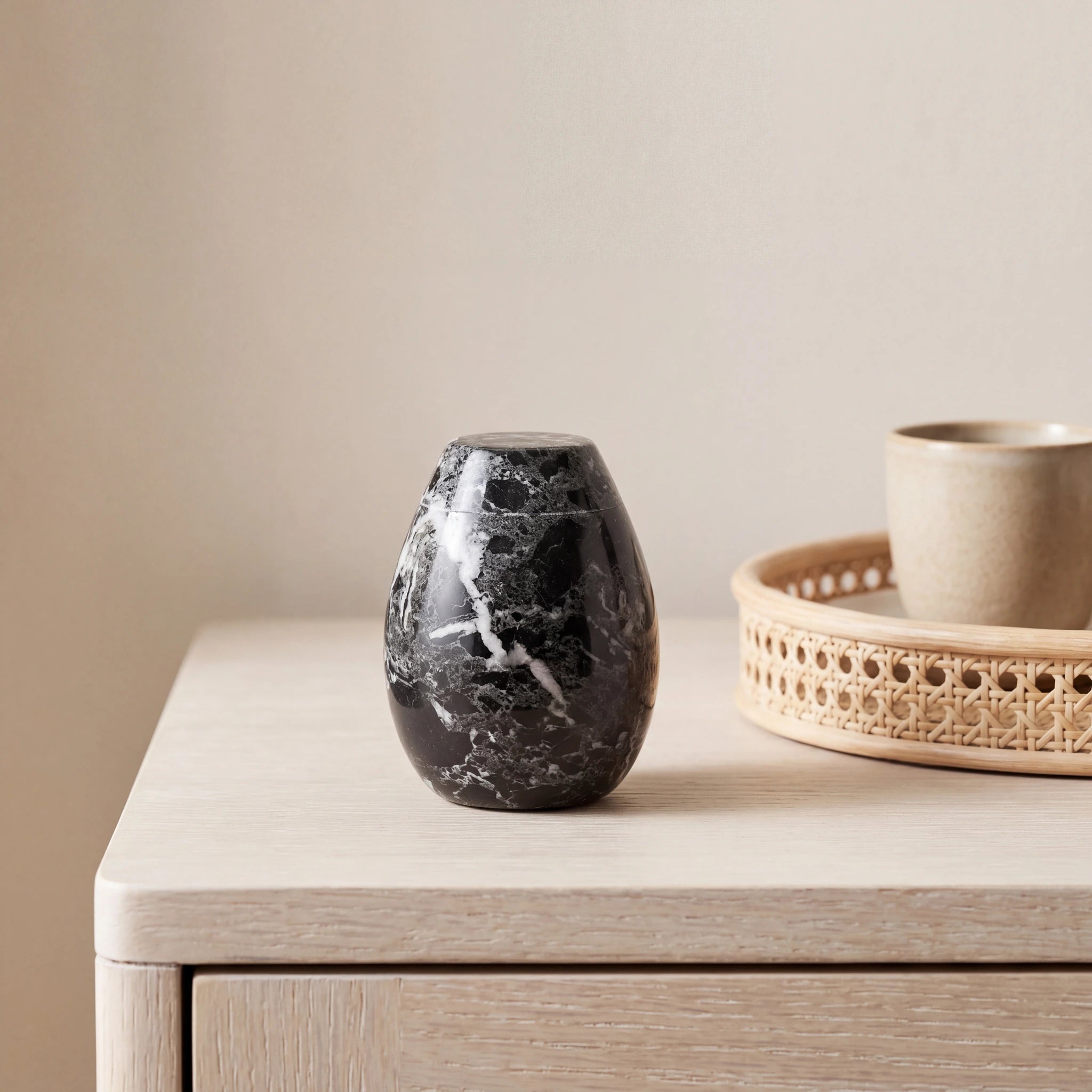 Marble-Keepsake-Urn-For-Ashes-in-Black-Grey-Cane-Tray