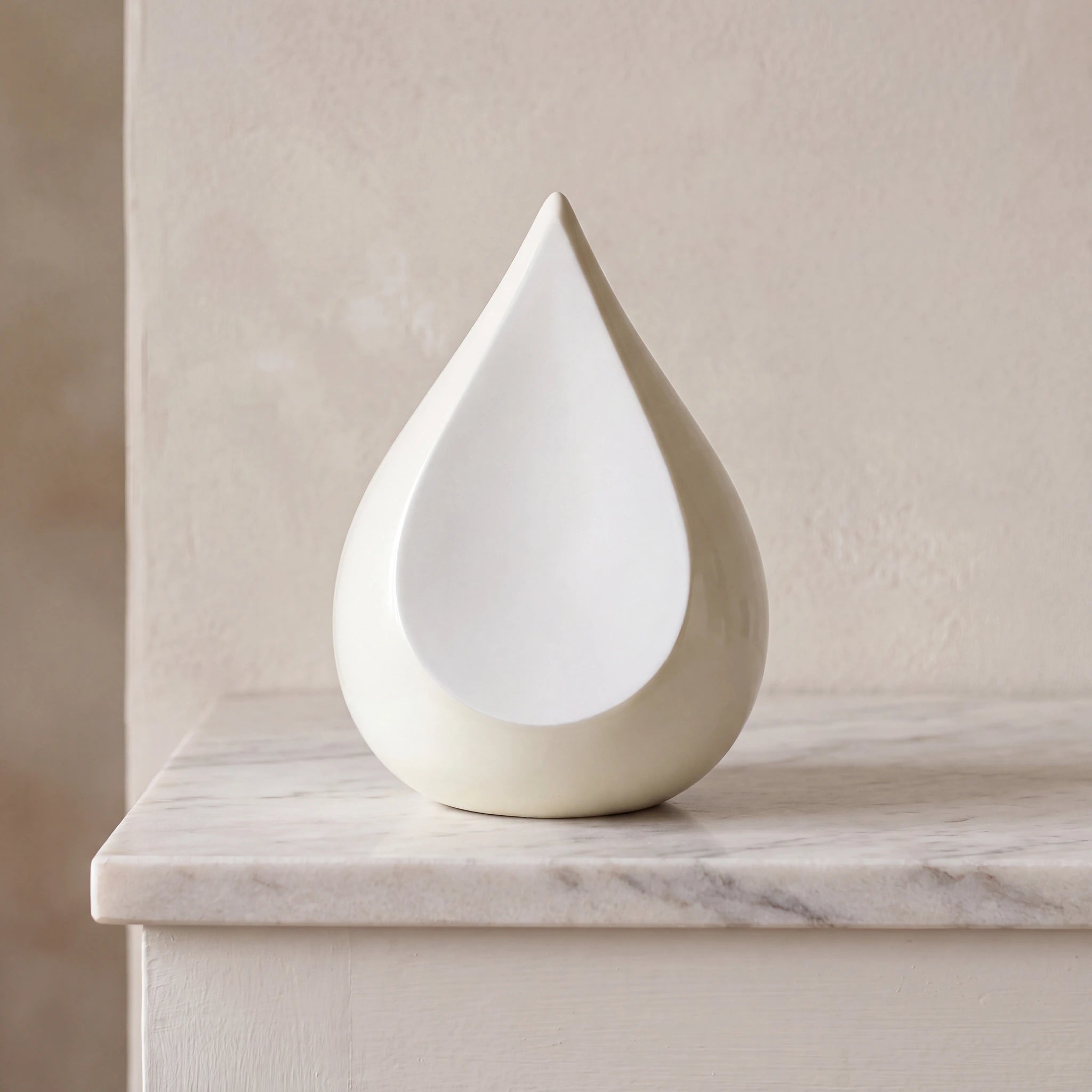 Odyssee Metal Teardrop Urn for Ashes in Ivory and White