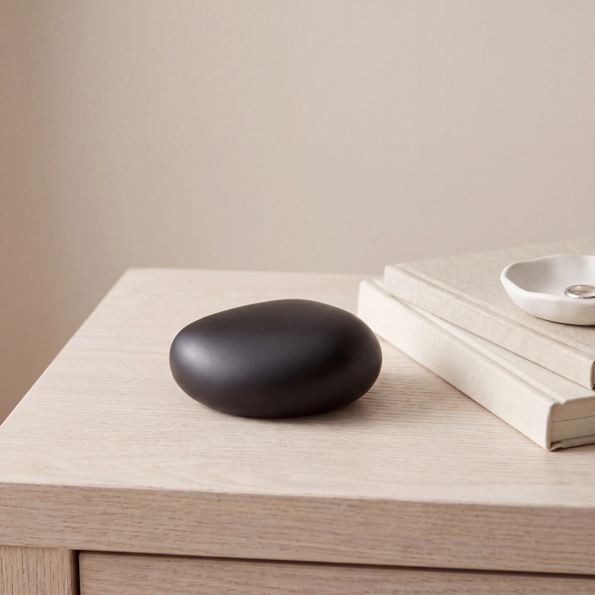 Palm-Stone-Small-Urn-for-Ashes-in-Matte-Black-keepsake_books_dish