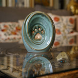 Paw Print Pet Urn for Ashes in Oily Green