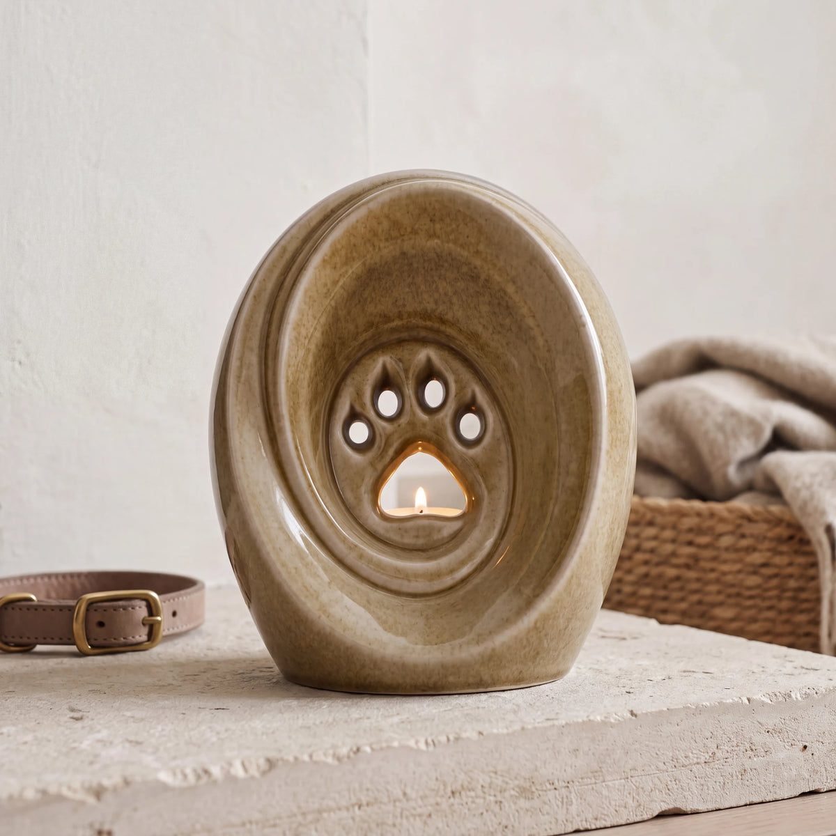 Paw-Pet-Urn-for-Ashes-in-Dark-Sand-pet_hearth_basket