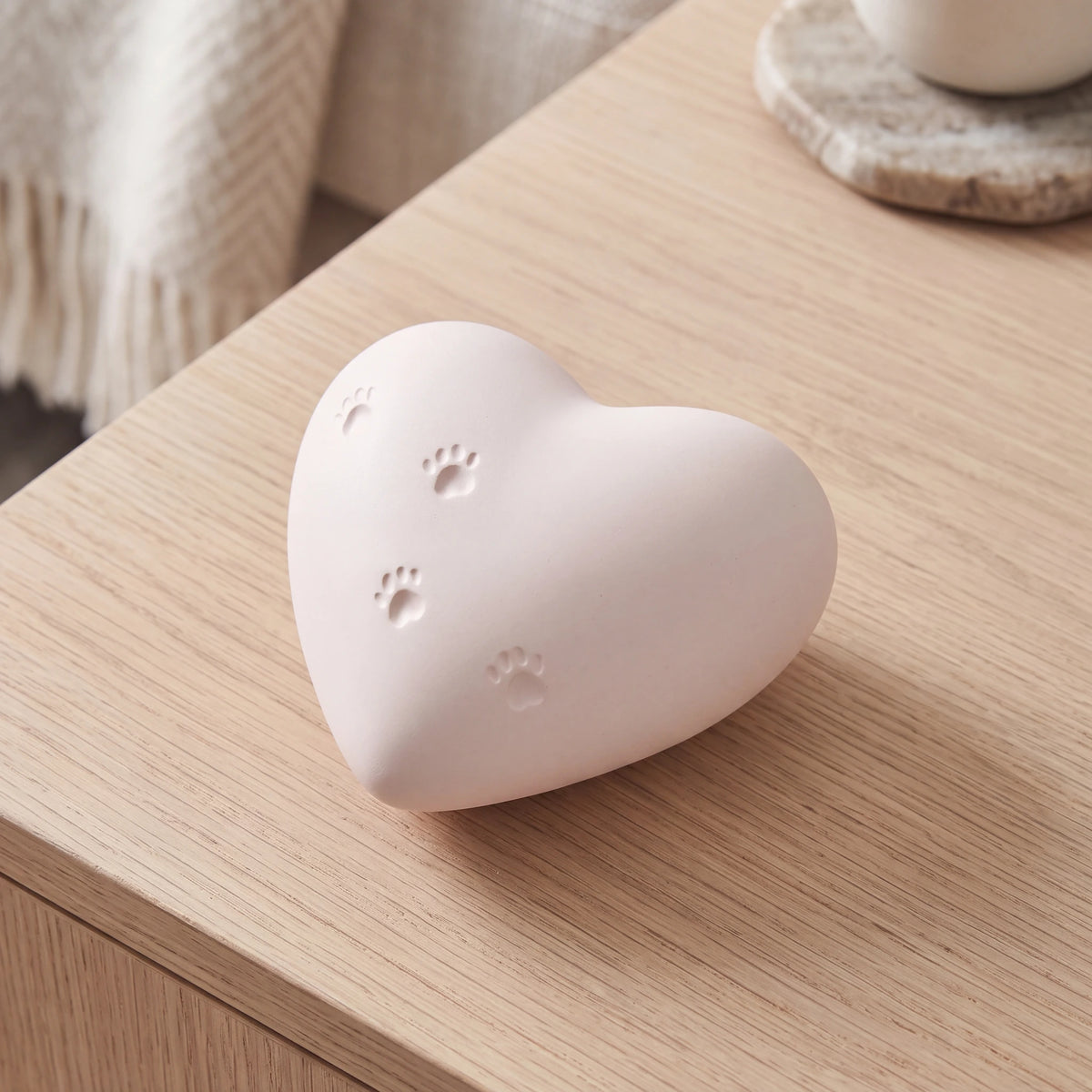 Paw-Print-Heart-Mini-Pet-Urn-for-Ashes-in-White-On-Oak