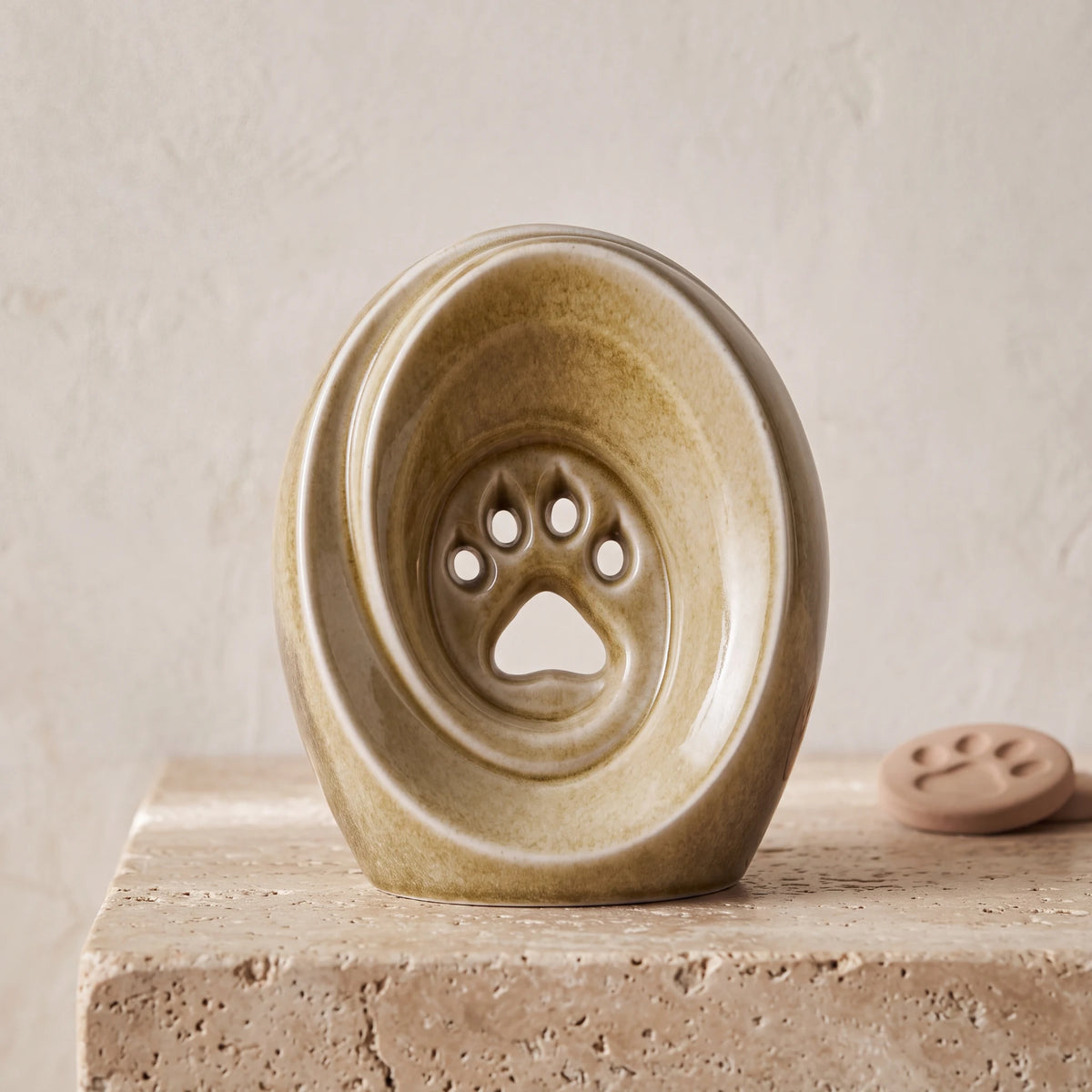 Paw-Print-Pet-Urn-for-Ashes-in-Light-Sand-pet_paw_token
