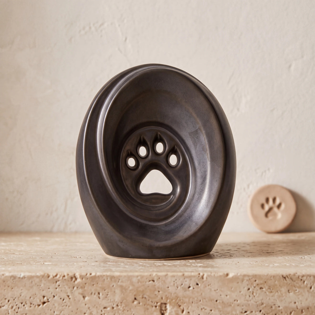 Paw-Print-Pet-Urn-for-Ashes-in-Matte-Black-pet_paw_token