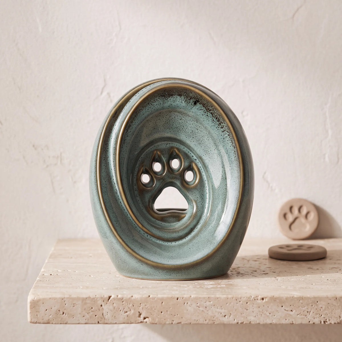 Paw-Print-Pet-Urn-for-Ashes-in-Oily-Green-pet_paw_token