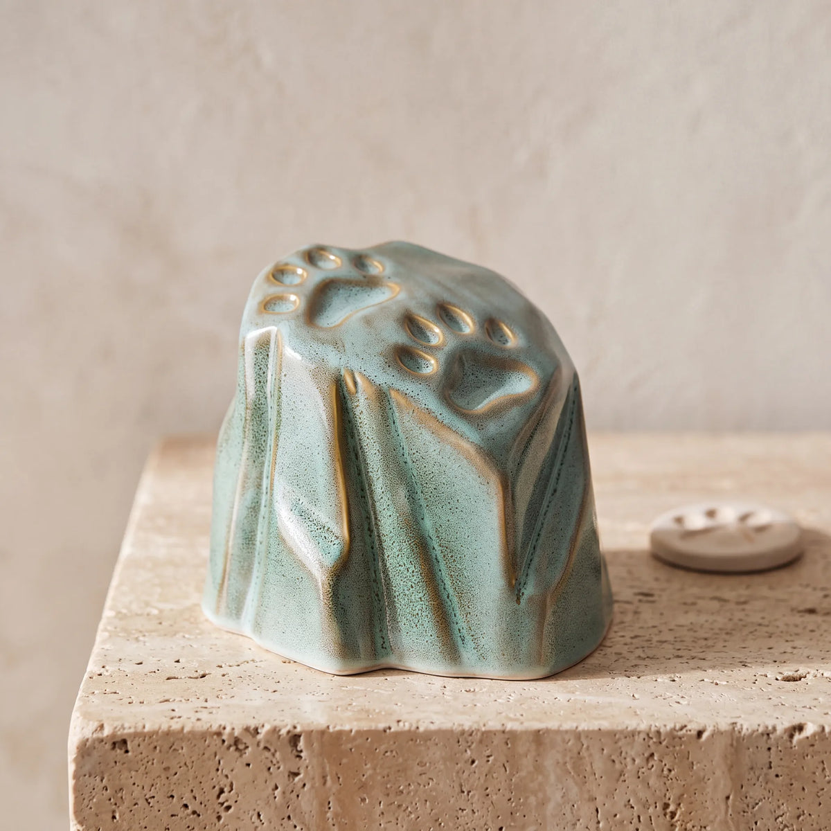 Paw-Prints-Pet-Urn-for-Ashes-in-Oily-Green-pet_paw_token