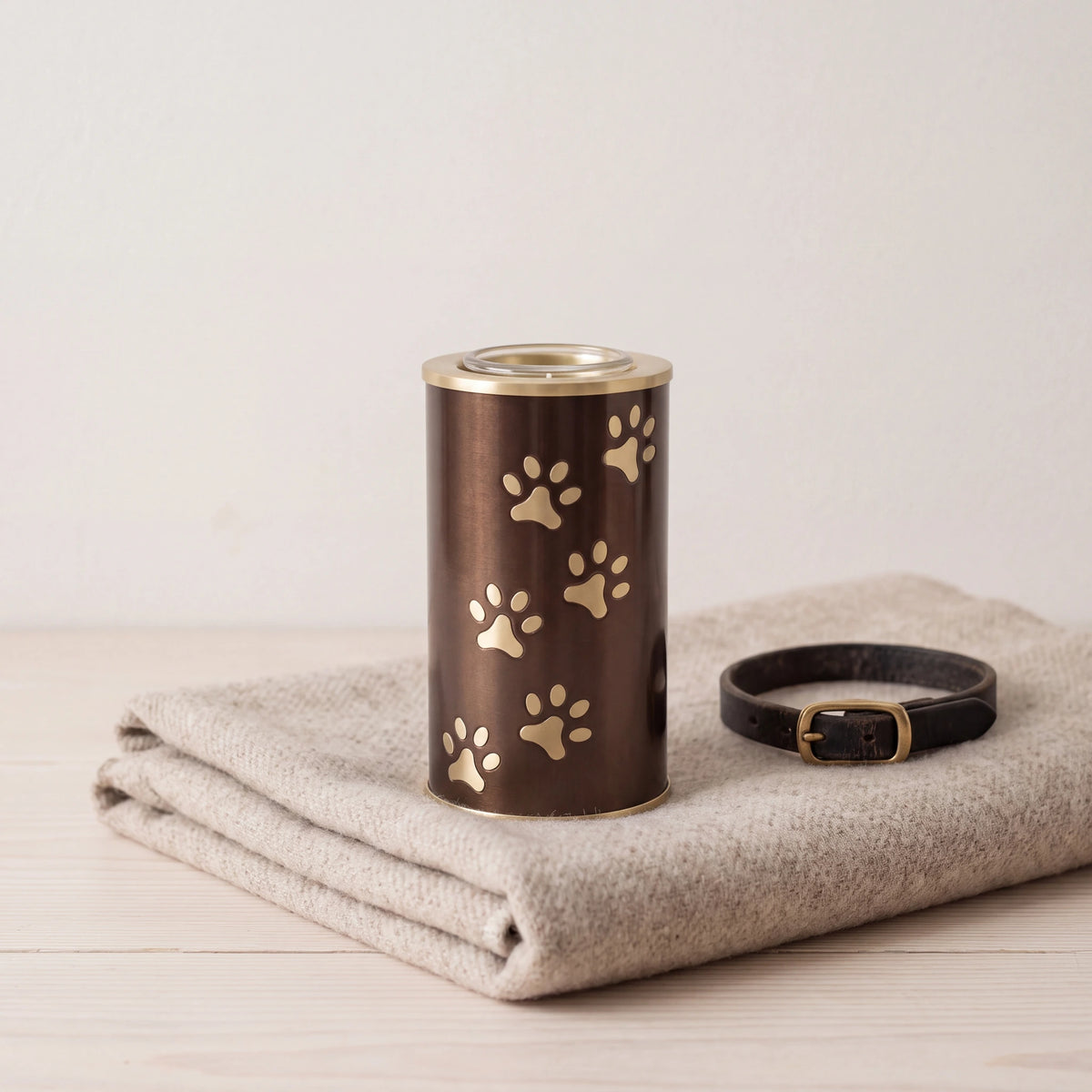 Pawprints-Candle-Pet-Urn-for-Ashes-in-Brown-and-Gold-Small-pet_blanket_fold