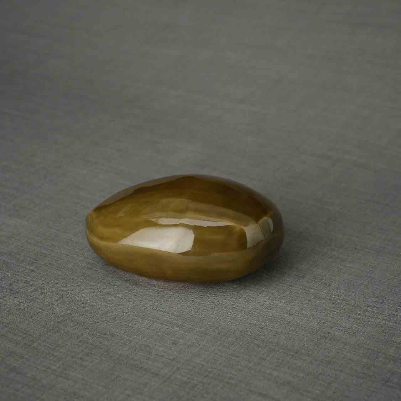 Pebbles Ashes Keepsake Urn in Brown Dark Background