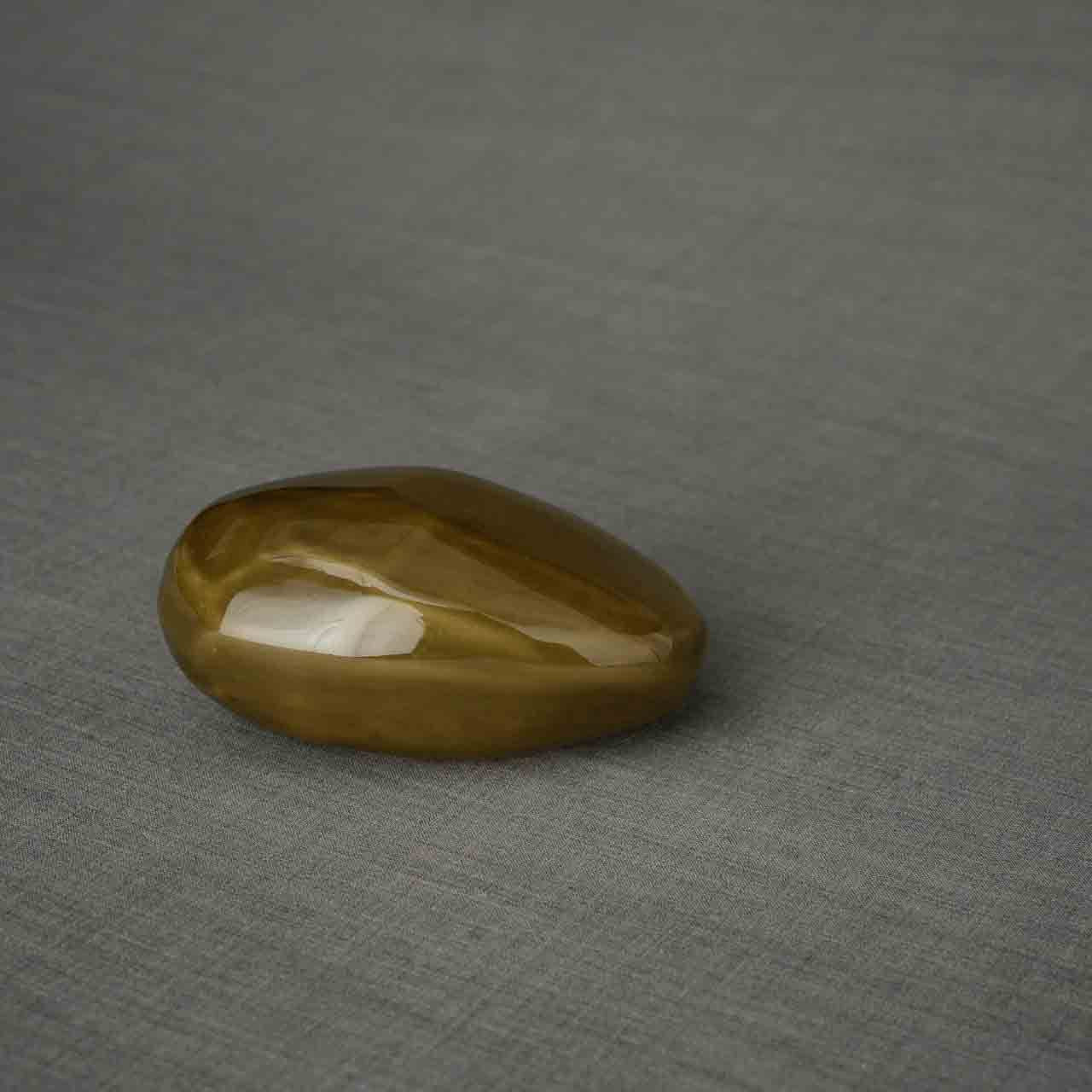 Pebbles Ashes Keepsake Urn in Brown Facing Right Dark Background