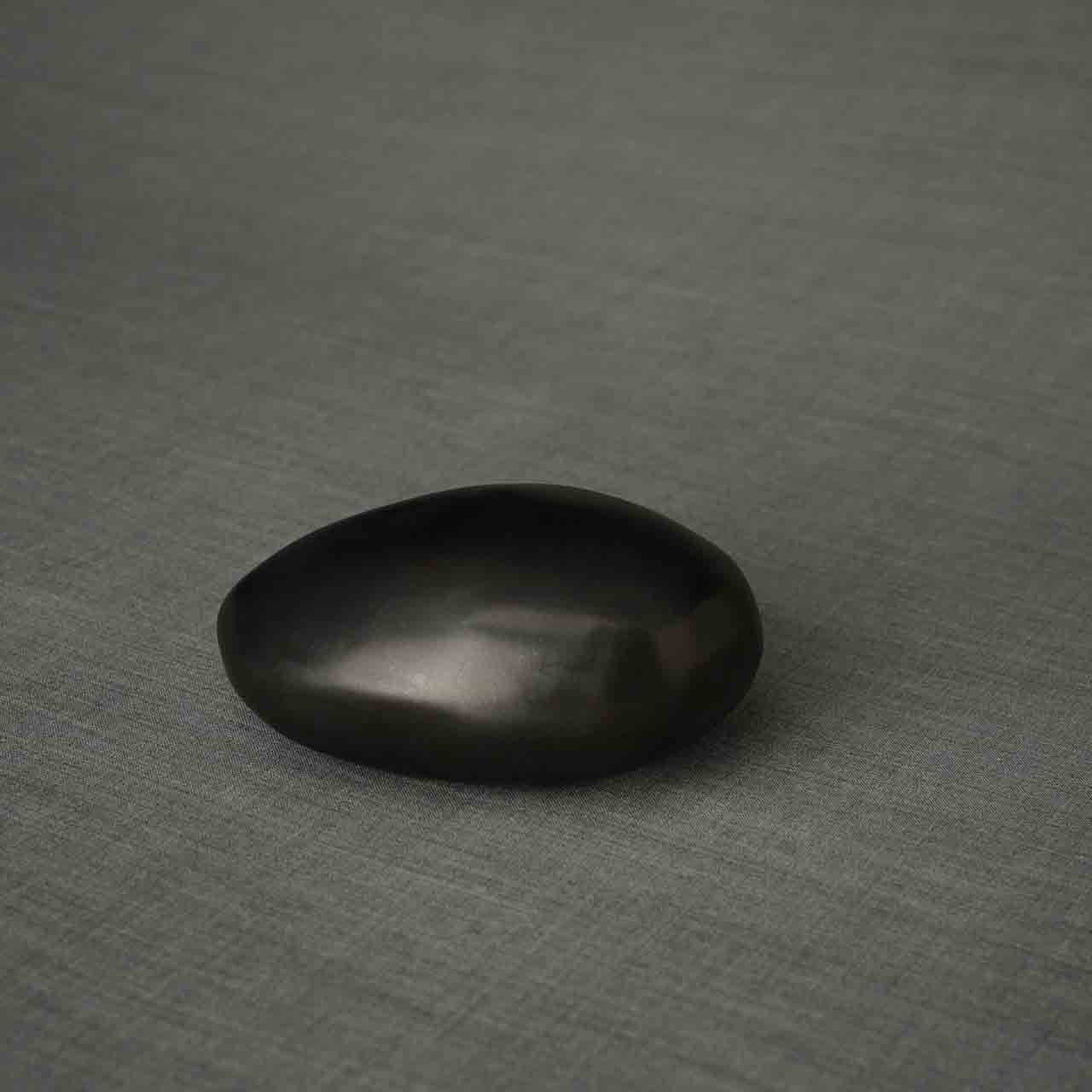 Pebbles Ashes Keepsake Urn in Matte Black Dark Background