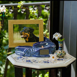 Picture Frame Pet Urns For Ashes In Blue Ceramic With Photo Of Dog On Shelf Zoomed Out