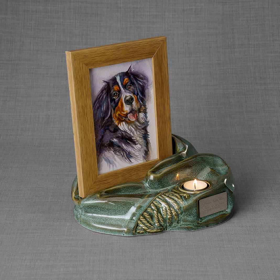 Picture Frame Pet Urns For Ashes In Oily Green Ceramic Facing Right With Photo Of Dog