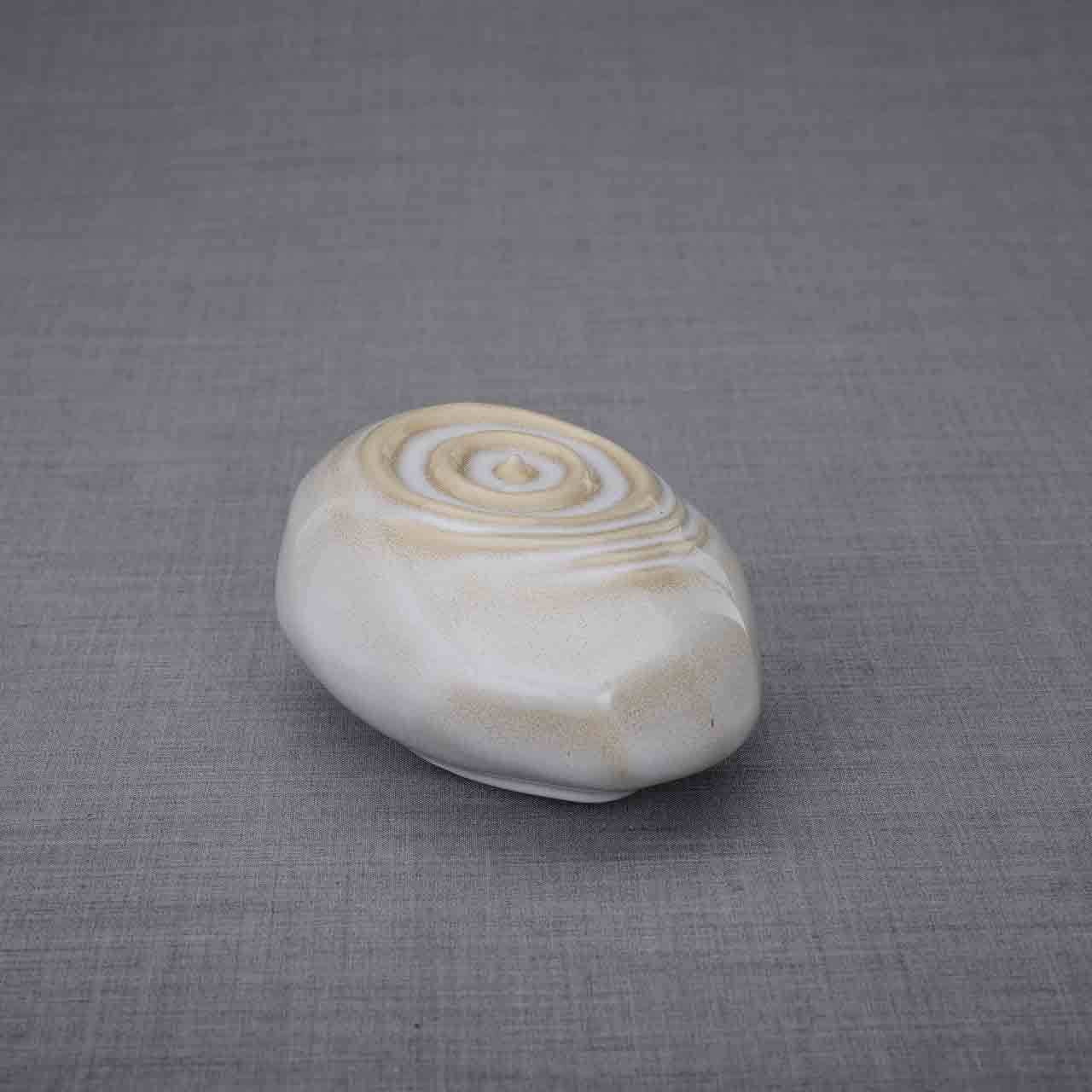 Resonance Ashes Keepsake Urn in Beige Grey Facing Left Dark Background