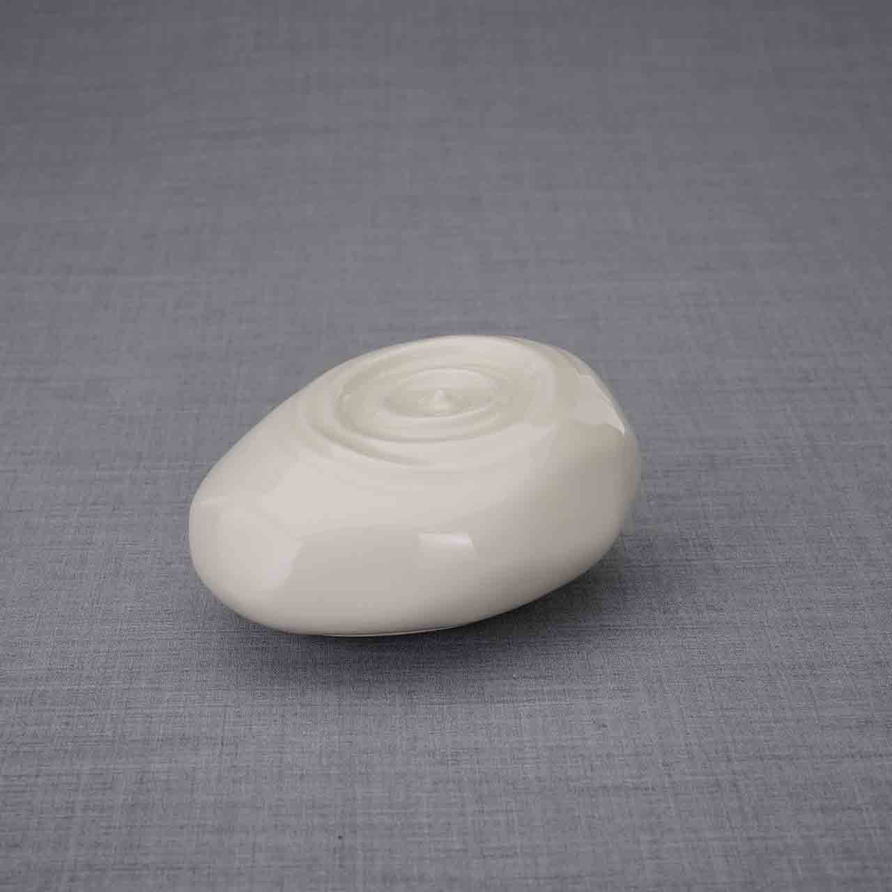 Resonance Ashes Keepsake Urn in Cream Dark Background