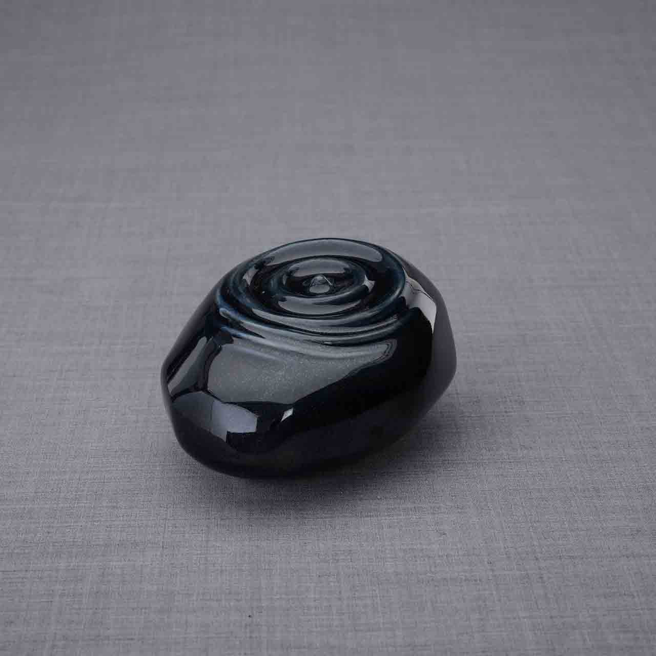 Resonance Ashes Keepsake Urn in Glossy Black Facing Left Dark Background
