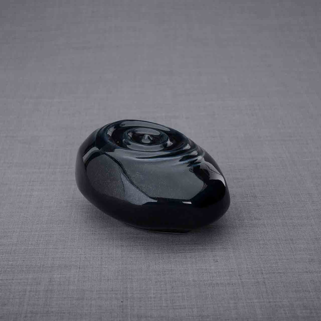 Resonance Ashes Keepsake Urn in Glossy Black Facing Right Dark Background